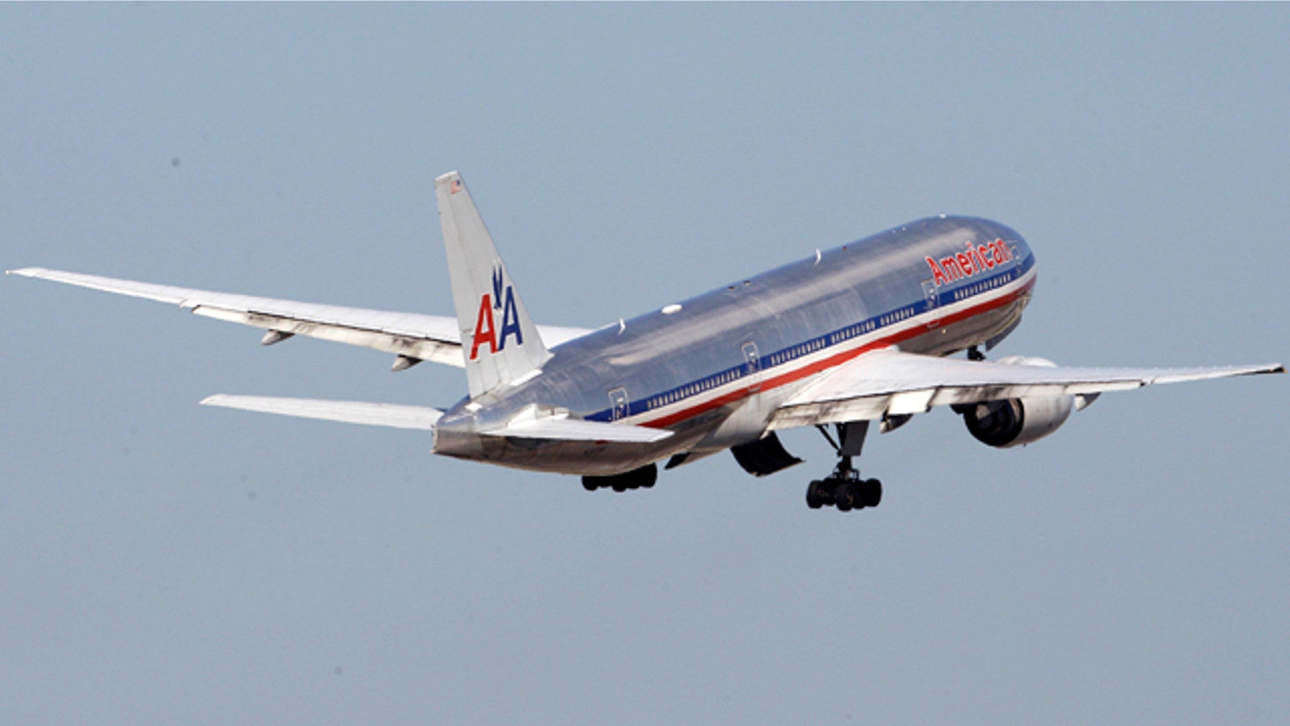 FILE -An American Airlines airplane takes off at Miami International Airport in Miami.