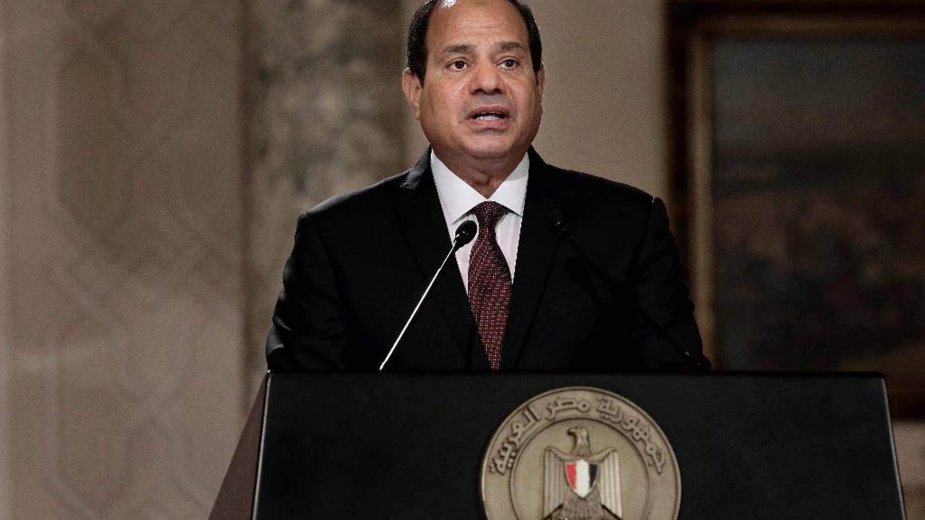 FILE -- In this June 1, 2016 file photo, Egyptian President Abdel-Fattah el-Sissi, speaks during a press conference with Hungarian Prime Minister Viktor Orban at the presidential palace in Cairo, Egypt. Egypt has blasted the EU and Britain for criticizing a recent court decision to freeze the assets of three rights activists, accusing them of double standards and telling them to mind their own business. (AP Photo/Nariman El-Mofty, File)