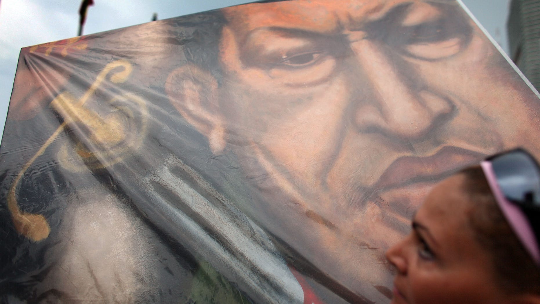 Sept 4: Hugo Chávez may have the most Twitter followers out of any Latin American president but protests around the globe on this day in 2009 were organized online through Facebook and Twitter. (Photo by Joe Raedle/Getty Images)