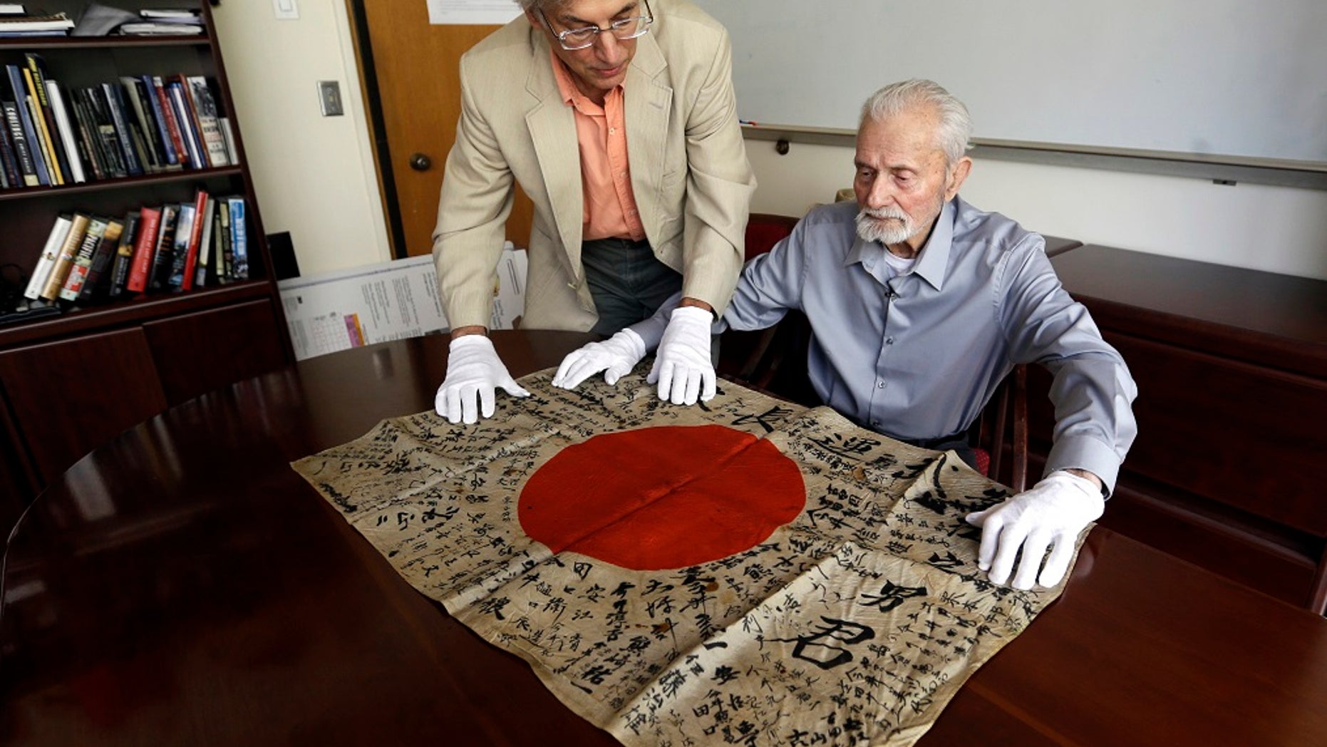 WWII veteran Marvin Strombo will return a flag from a dead Japanese soldier more than 70 years ago.