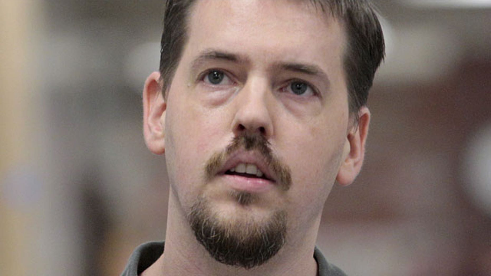 In this Aug. 23, 2011 file photo, Josh Powell, husband of missing Utah woman Susan Cox Powell, walks to a court hearing in Tacoma, Wash.