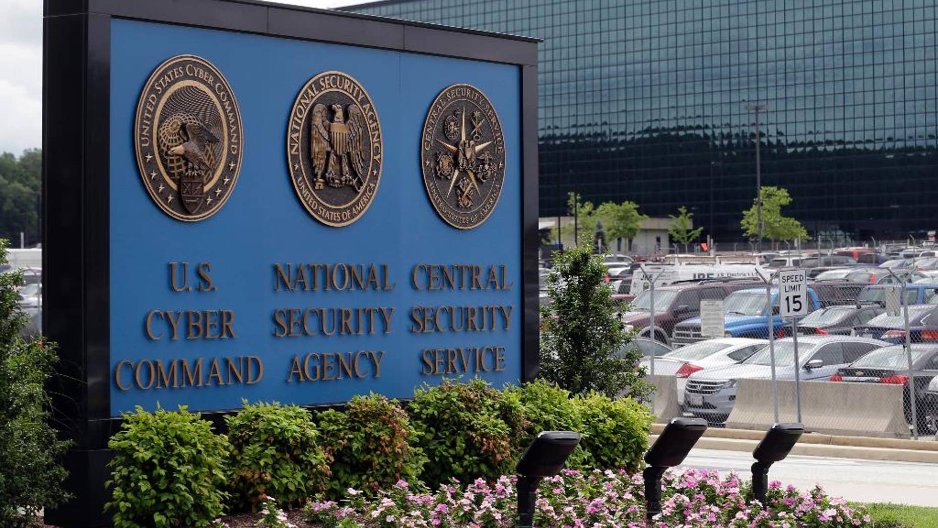 FILE - This June 6, 2013 file photo shows the sign outside the National Security Agency campus in Fort Meade, Md. The House is poised to take the first significant step to change the National Security Agency’s bulk collection of American phone records, a compromise bill that is displeasing many civil liberties activists. The bill, scheduled for a House vote on May 22, 2014, instructs the phone companies to hold the records for 18 months and let the NSA search them in terrorism investigations in response to a judicial order. (AP Photo/Patrick Semansky, File)