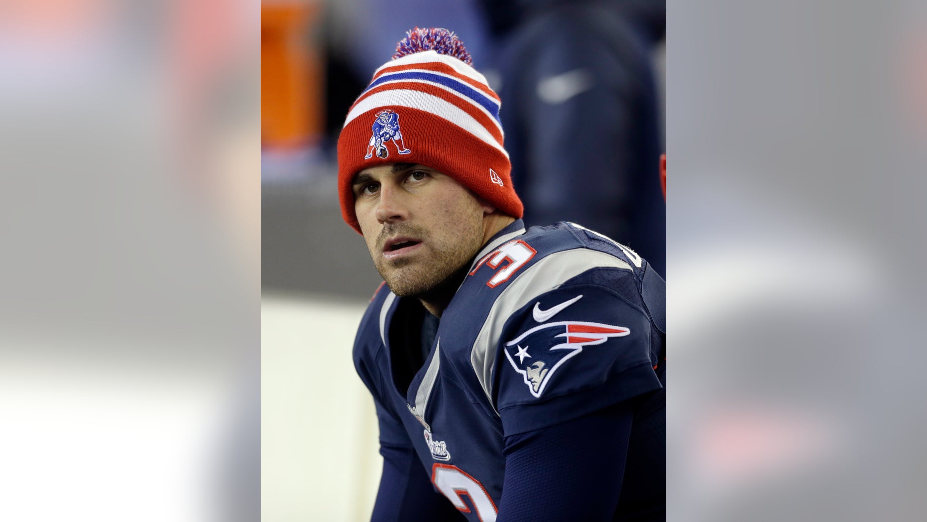 FILE - In this Nov. 3, 2013 file photo, New England Patriots kicker Stephen Gostkowski (3) watches from the bench in the fourth quarter of an NFL football game against the Pittsburgh Steelers, in Foxborough, Mass. Gostkowski sings on the sideline when he's getting ready to kick. On Saturday night, ,Jan. 11, 2014, he could be in full voice and in position to beat the Indianapolis Colts. (AP Photo/Steven Senne, File)