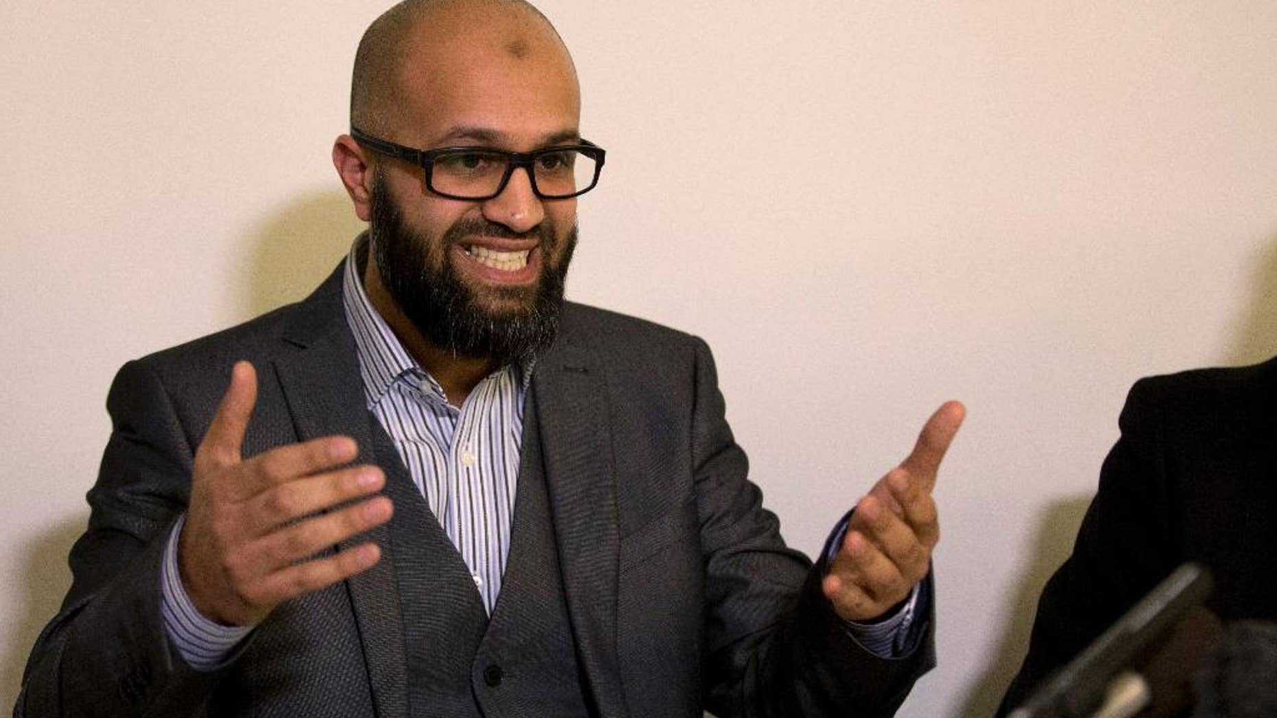 CAGE research director, Asim Qureshi talks during a press conference held by the CAGE human rights charity in London, Thursday, Feb. 26, 2015. A British-accented militant who has appeared in beheading videos released by the Islamic State group in Syria bears ìstriking similaritiesî to a man who grew up in London, a Muslim lobbying group said Thursday. Mohammed Emwazi has been identified by news organizations as the masked militant more commonly known as ìJihadi John.î London-based CAGE, which works with Muslims in conflict with British intelligence services, said Thursday its research director, Asim Qureshi, saw strong similarities, but because of the hood worn by the militant, ìthere was no way he could be 100 percent certain.î (AP Photo/Matt Dunham)