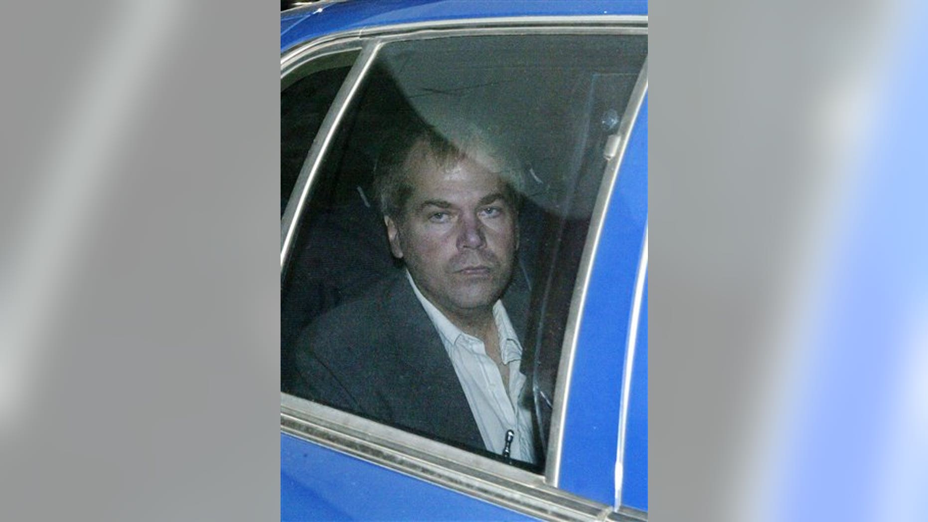 FILE - In a Nov. 18, 2003 file photo, John Hinckley Jr. arrives at U.S. District Court in Washington. Hinckley, who shot Reagan in 1981 to impress actress Jodie Foster, was found not guilty by reason of insanity in the assassination attempt. He has been held for the past three decades at a Washington psychiatric hospital, but has been granted increasing freedom in recent years as doctors say his mental illness has been in remission. (AP Photo/Evan Vucci, File)
