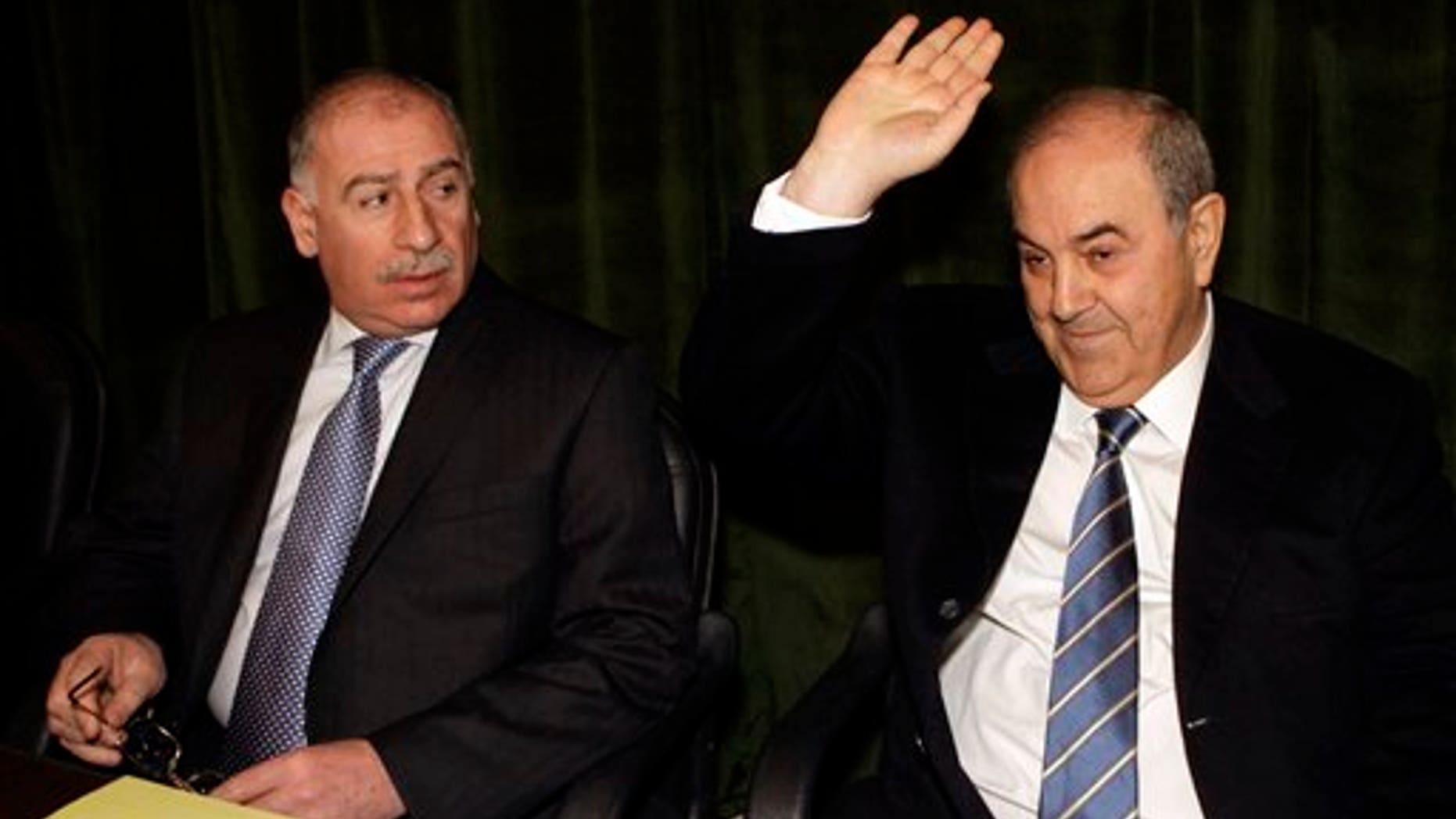 Jan. 18: Ayad Allawi, the leader of Iraq's main Sunni-backed and former Prime Minister, right, gestures as Iraq's Parliament Speaker Osama al-Nujaifi looks on during a meeting for the main Sunni-backed bloc in Baghdad, Iraq.