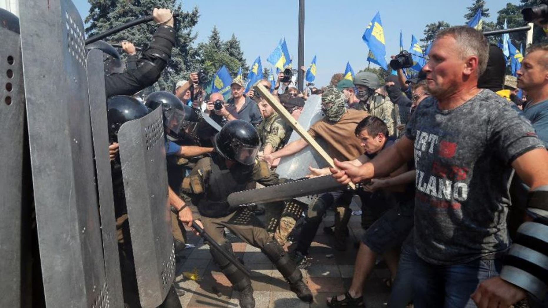 August 31, 2015: Ukraine protesters clash with police in Kiev after vote to give greater powers to the east.