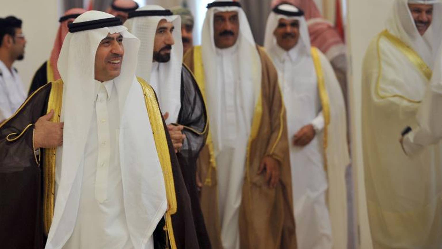Saudi deputy Interior Minister Ahmed al-Salem (left) and his counterparts arrive to attend a meeting of deputy interior ministers of the Gulf Cooperation Council on September 15, 2013 in Riyadh