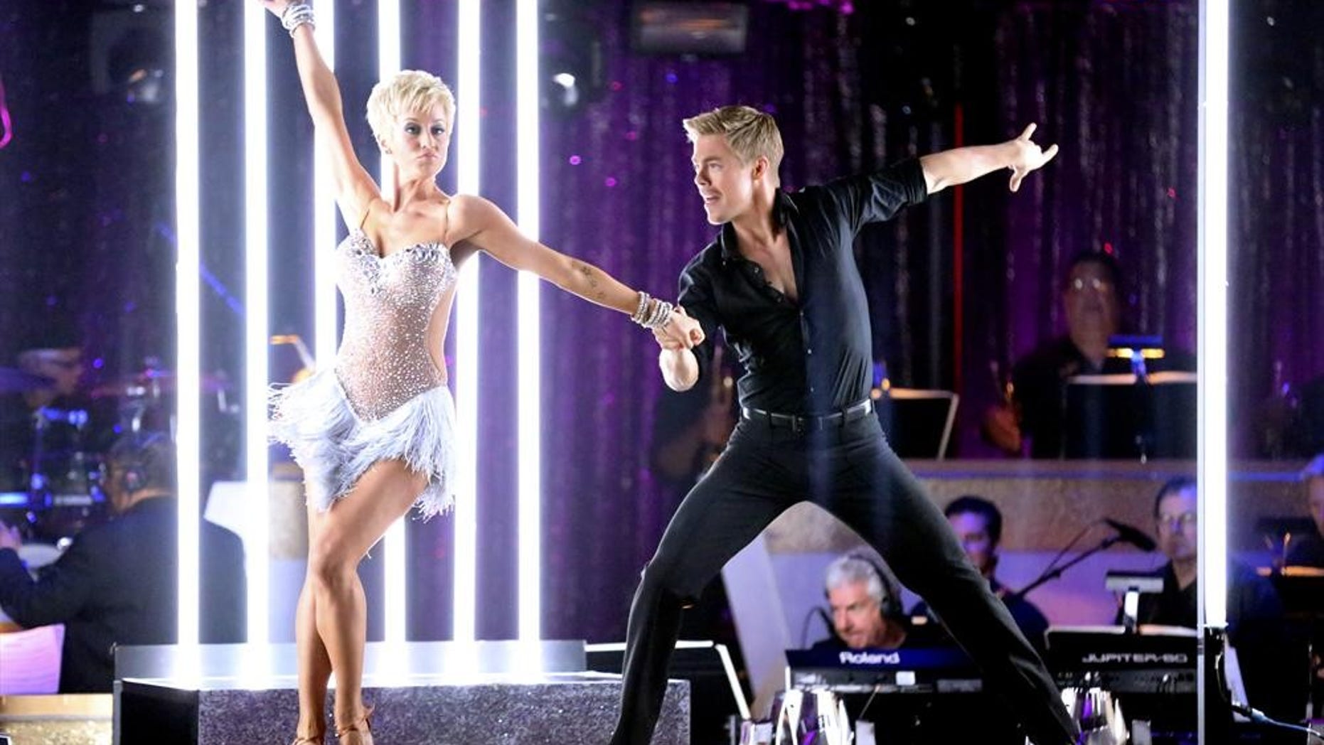 Singer Kellie Pickler and professional dancer Derek Hough competing on Dancing with the Stars.