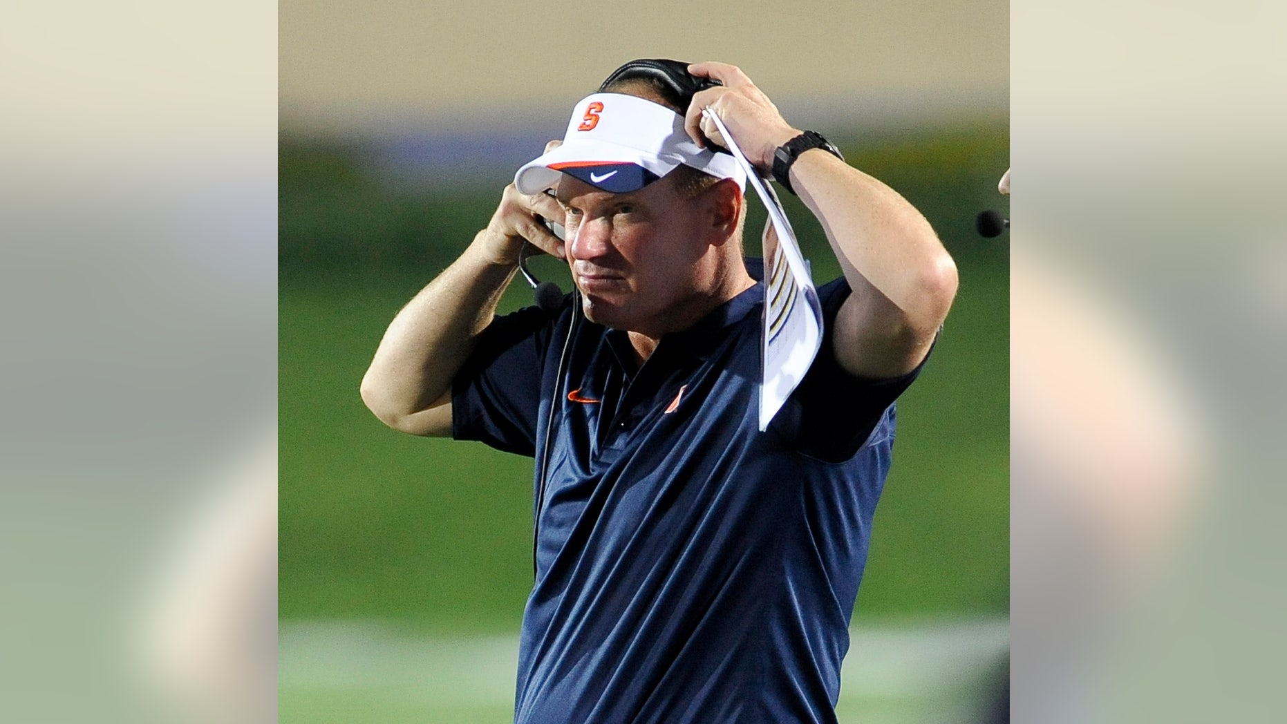 FILE - In this Sept. 7, 2013 file photo, Syracuse NCAA college football coach Scott Shaferwatches the action during an NCAA college football game against Northwestern University in Evanston, Ill. Shafer has had a bye week to right what went wrong against Georgia Tech. There was a lot to work on. (AP Photo/Matt Marton, File)
