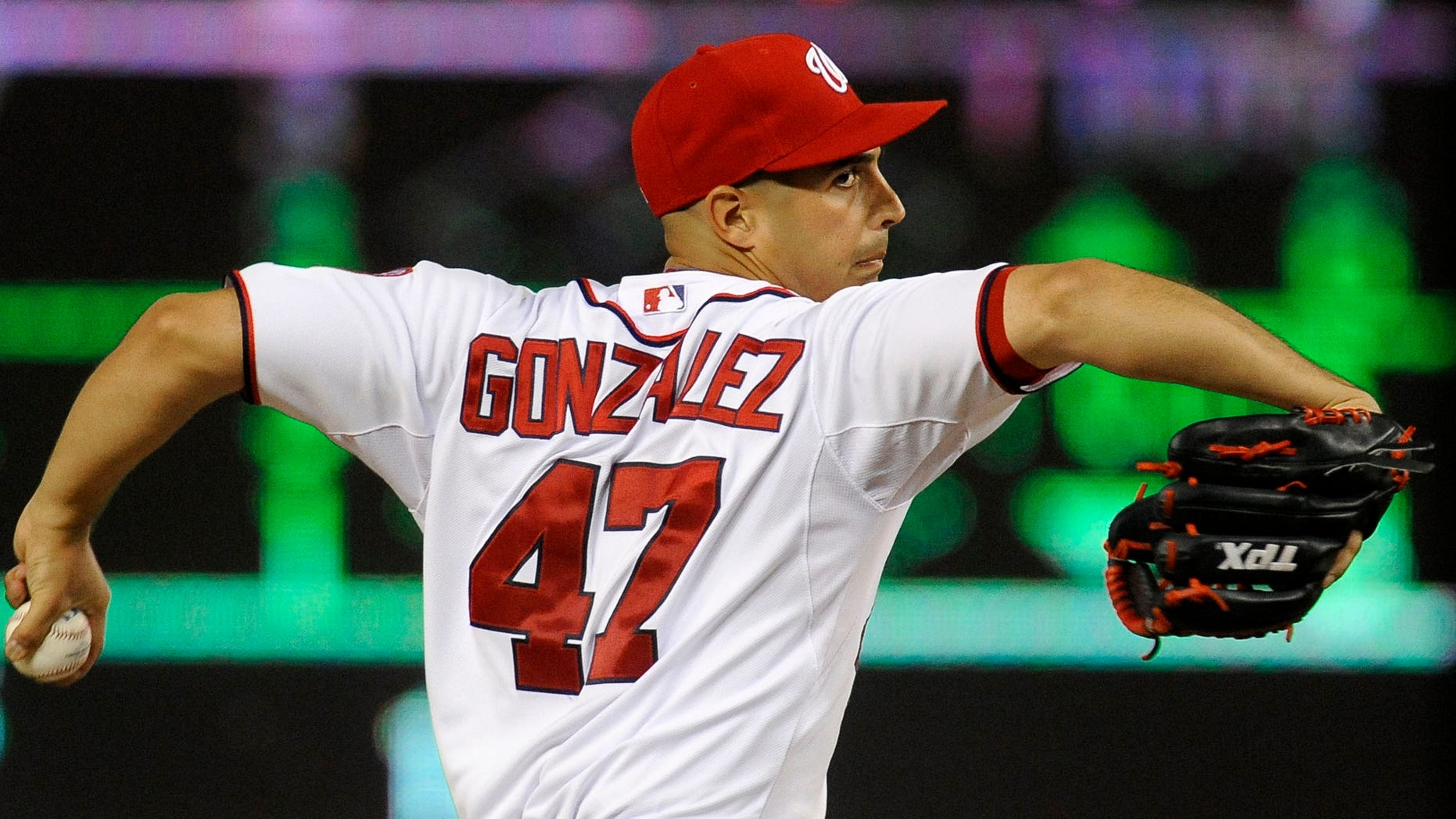 Washington Nationals' starting pitcher Gio Gonzalez delivers in the seventh inning to the Chicago Cubs during their baseball game at Nationals Park, Wednesday, Sept. 5, 2012, in Washington. The Nationals defeated the Cubs 9-1 and Gonzalez won his 18th game of the season. (AP Photo/Richard Lipski)