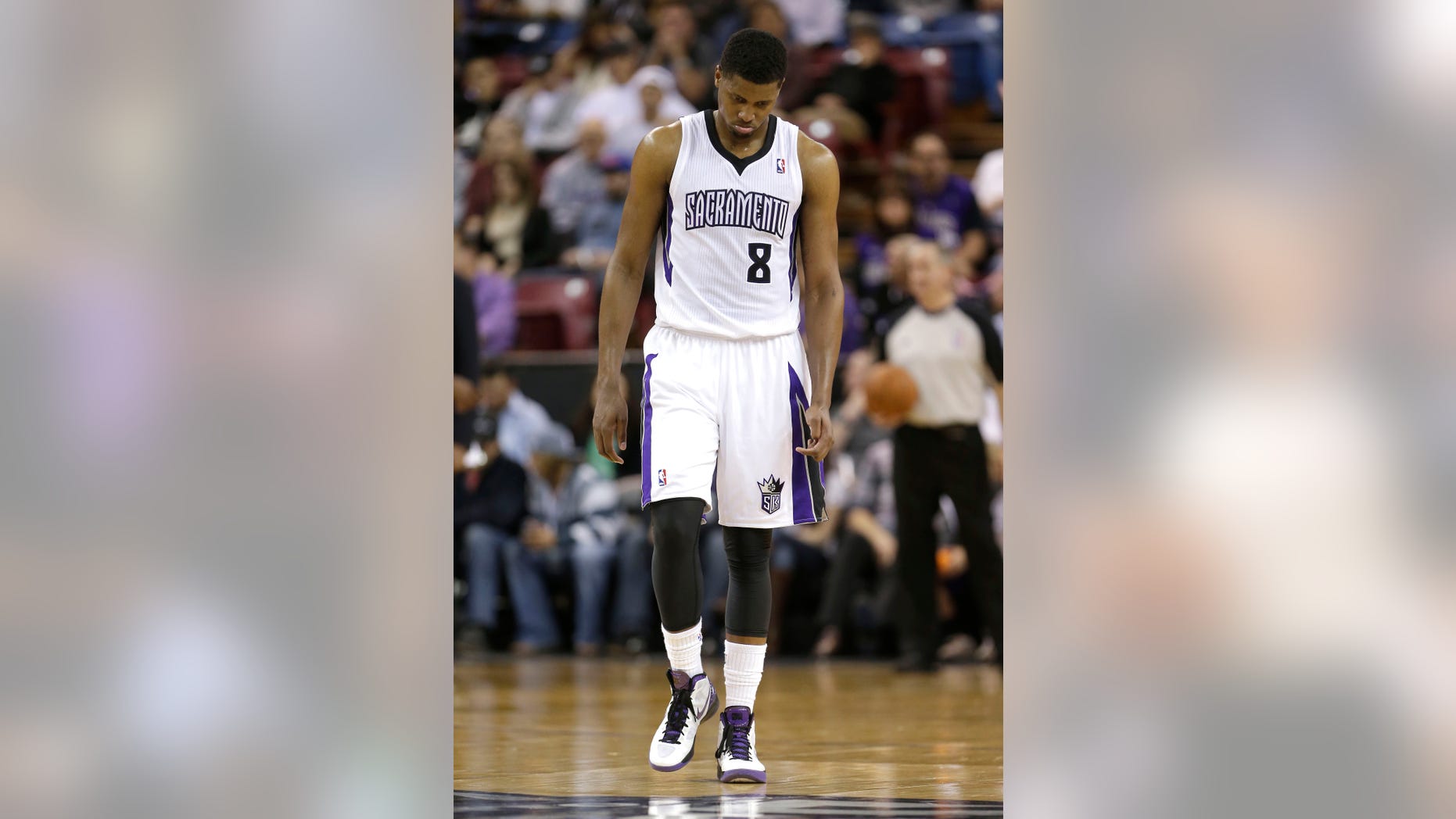 Sacramento Kings forward Rudy Gay walks down court in the closing moments of the Kings 101-92 loss to the Golden State Warriors in a NBA basketball game in Sacramento, Calif., Wednesday, Feb. 19, 2014. (AP Photo/Rich Pedroncelli)