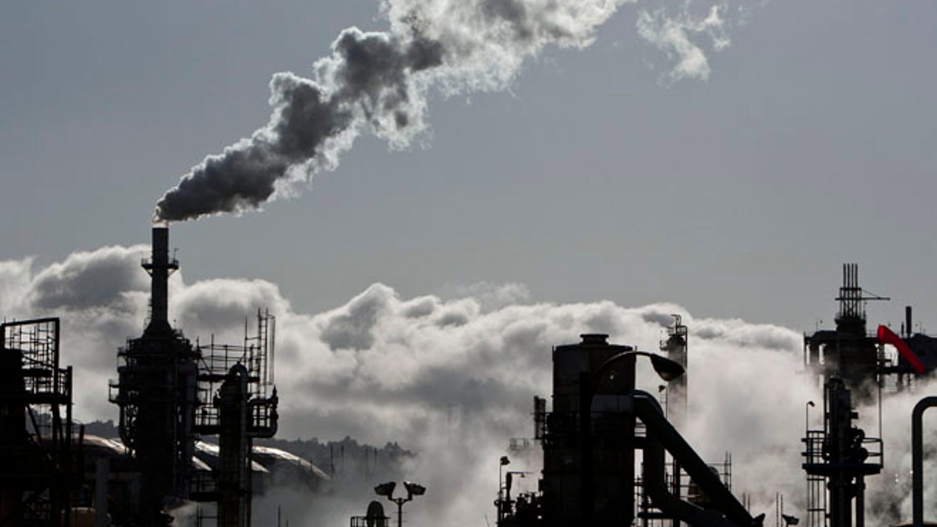 March 24, 2012: Smoke is released into the sky at a refinery in Wilmington, California.