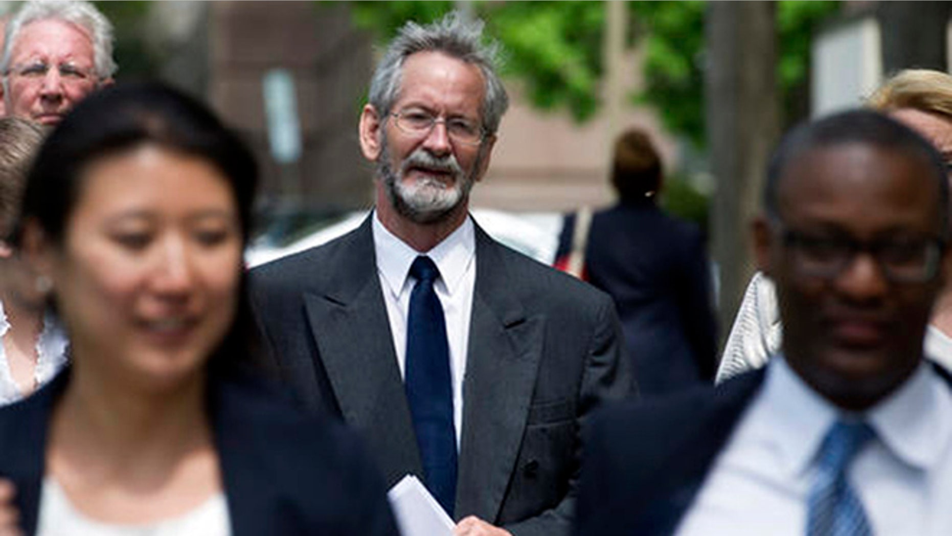 Douglas Hughes arrives at the Federal Courthouse in Washington, Thursday, April 21, 2016. Hughes, from Ruskin, Fla., flew a gyrocopter into restricted airspace over Washington, D.C., and is scheduled to be sentenced today.(AP Photo/Cliff Owen)