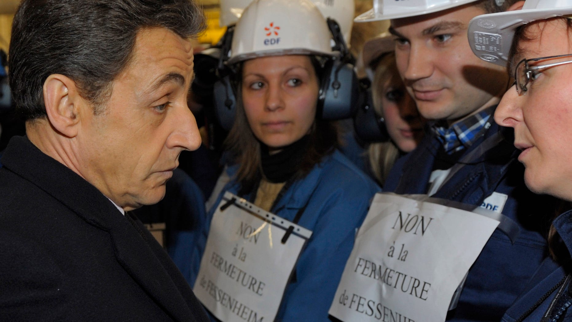 Feb. 9, 2012:France's President Nicolas Sarkozy, talks to workers at the nuclear power plant of Fessenheim, eastern France.