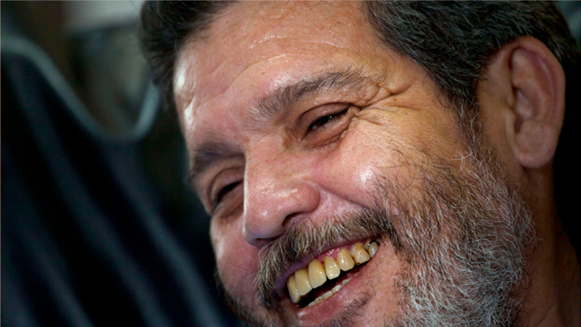 Marco Leon Calarca, spokesman and member of FARC smiles during an interview in Havana, Cuba, Friday, Sept 7, 2012. (AP Photo/Ramon Espinosa)