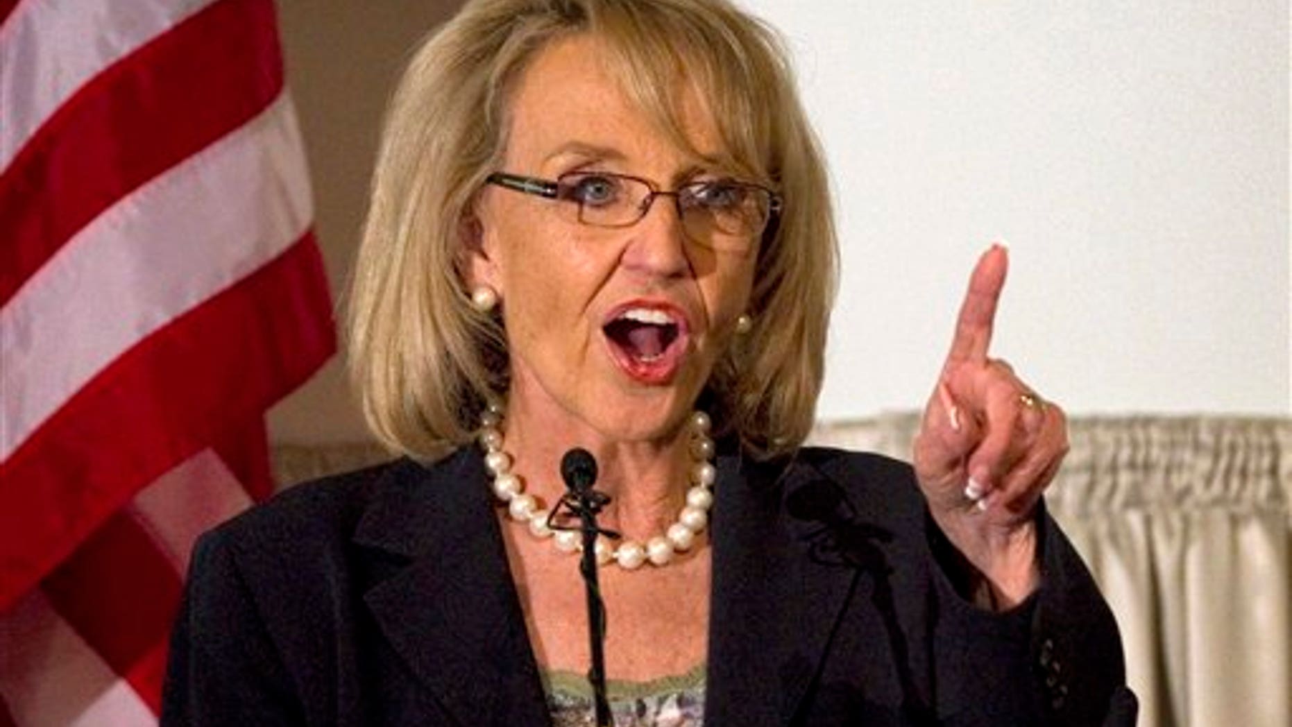 Arizona Gov. Jan Brewer, R, speaks Tuesday, April 19, 2011 at the Governor's Volunteer Awards luncheon in Phoenix. Brewer on Monday, April 18, 2011 vetoed a bill that would have required President Barack Obama and other presidential candidates to prove their U.S. citizenship before their names could appear on the state's ballot. (AP Photo/Matt York)