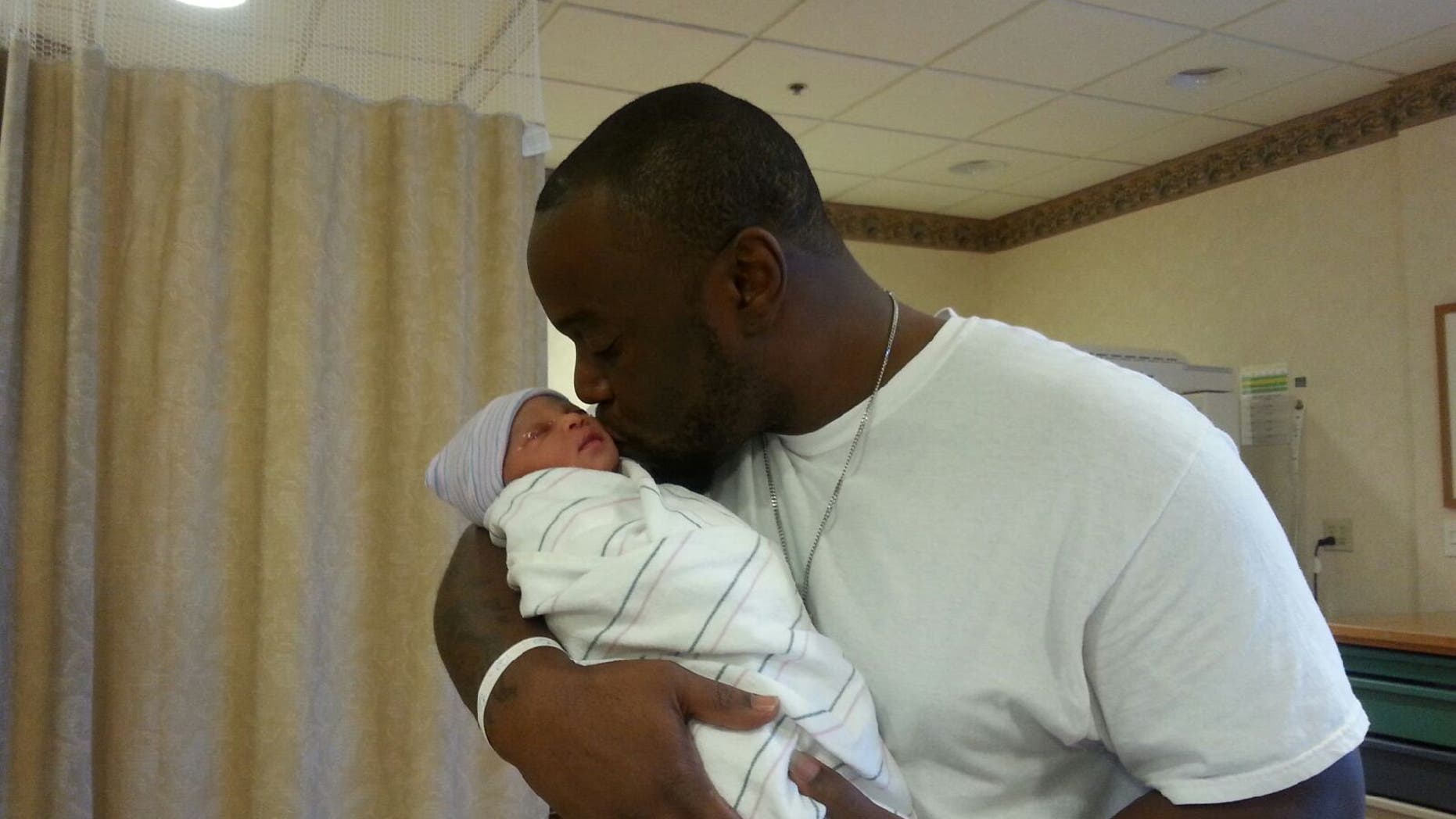 Johnny Davis was driving Tiffany Williams to Northside Hospital in DeKalb County on Wednesday when he was forced to pull over near a Waffle House and deliver their baby in the parking lot.