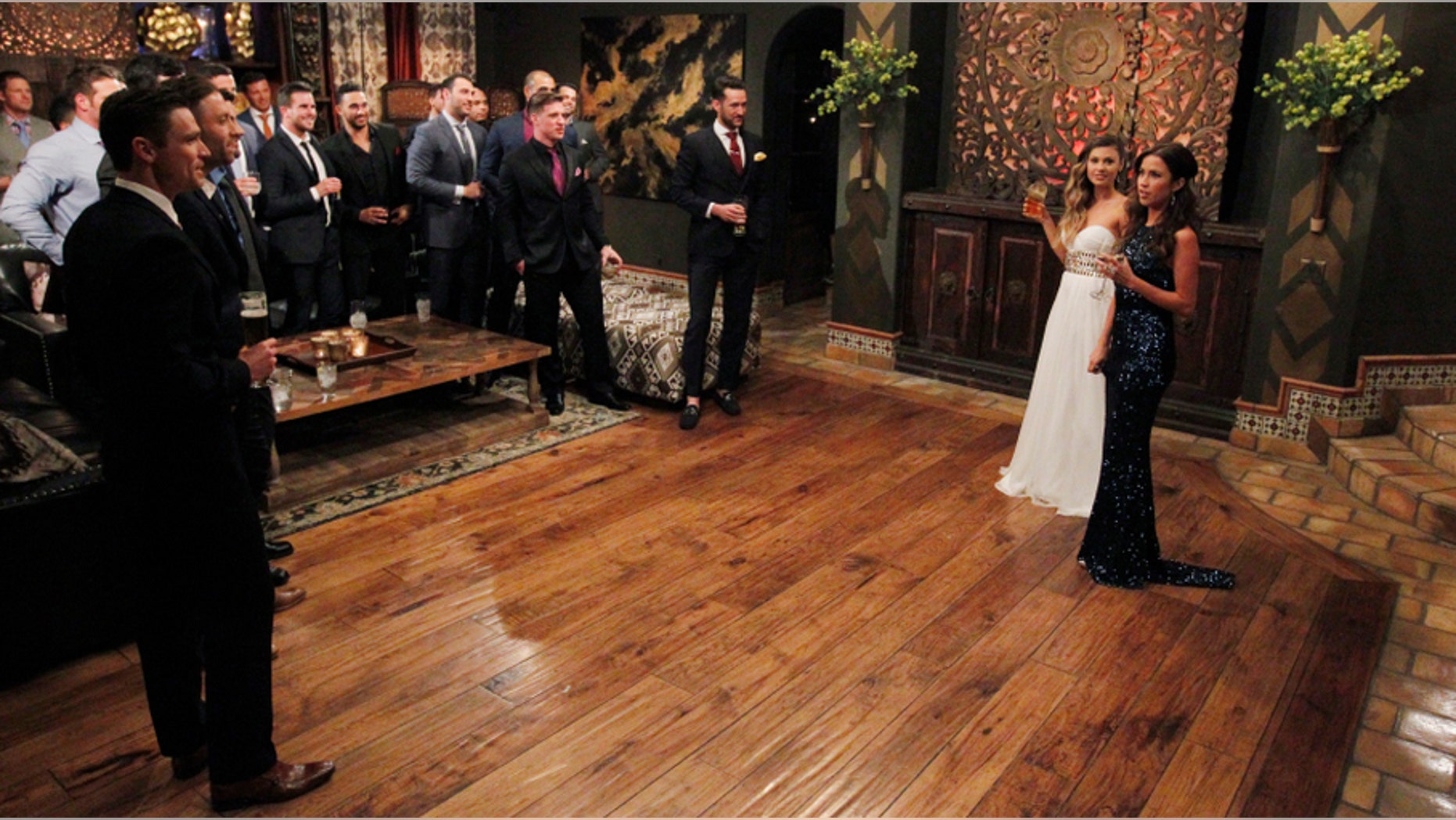 The entire cast of "The Bachelorette" is shown during the rose ceremony.