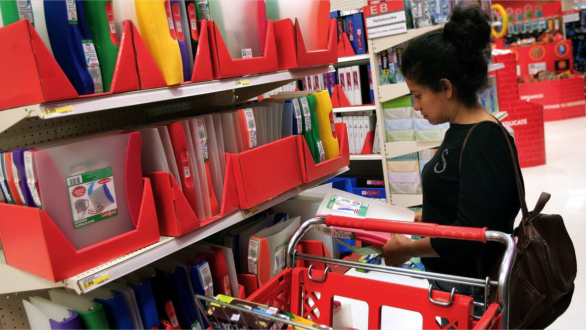 CHICAGO - AUGUST 29: Ada Dildine shops for her three daughters' back-to-school needs in a Target store August 29, 2006 in Chicago, Illinois. Public schools in Chicago are set to open September 5. (Photo by Tim Boyle/Getty Images)