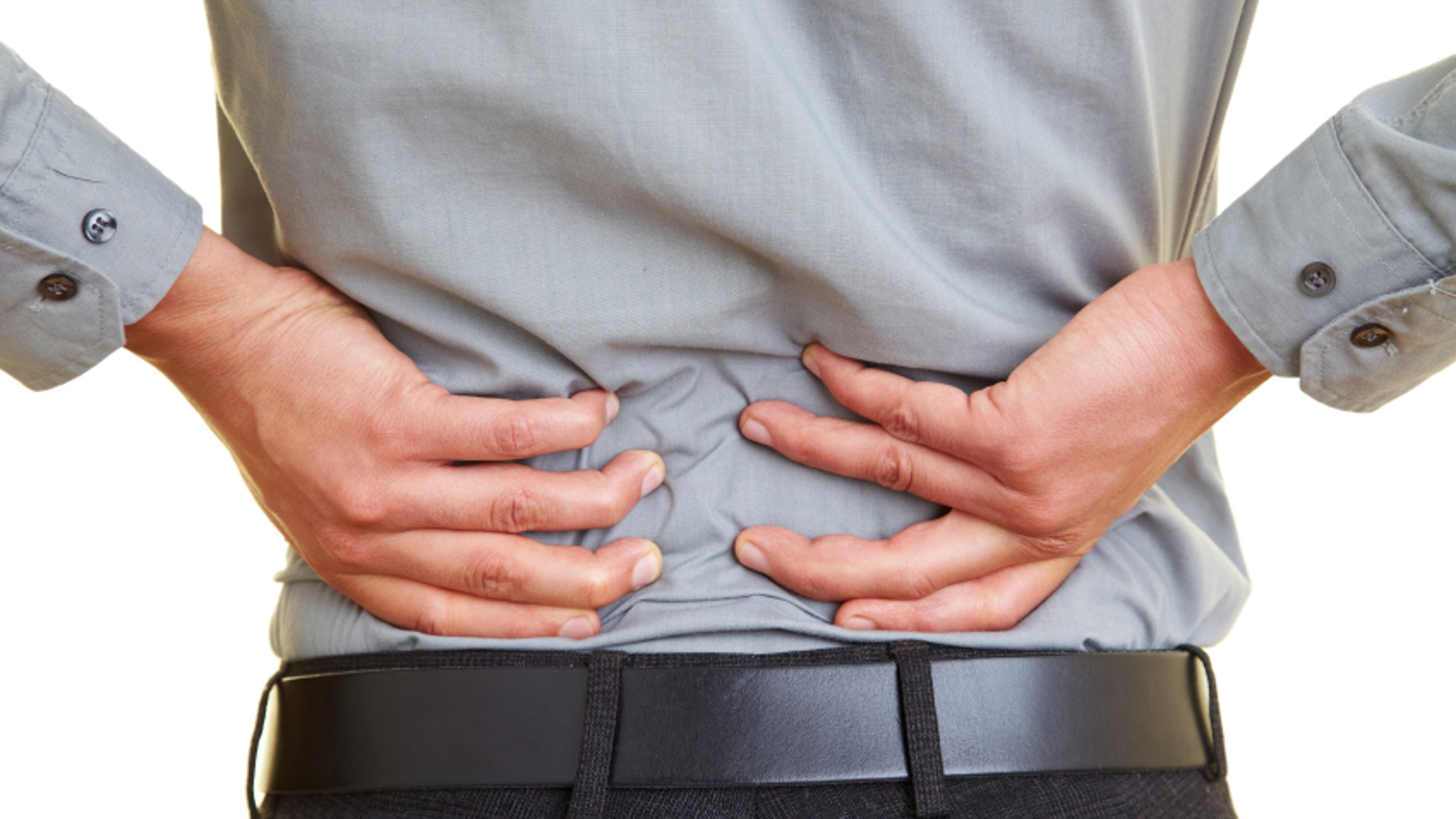 Man standing with pain in his back