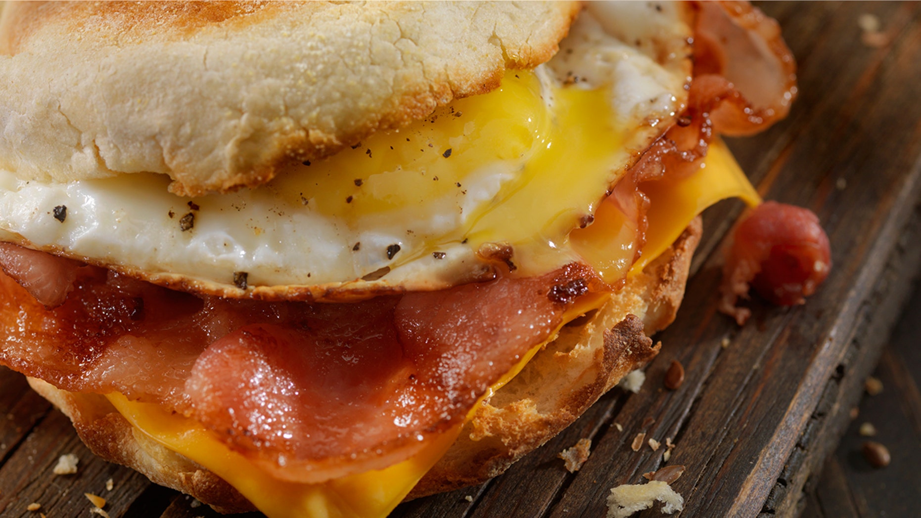 A plane passenger got into an argument with crew members when he found out he couldn't get a bacon sandwich.