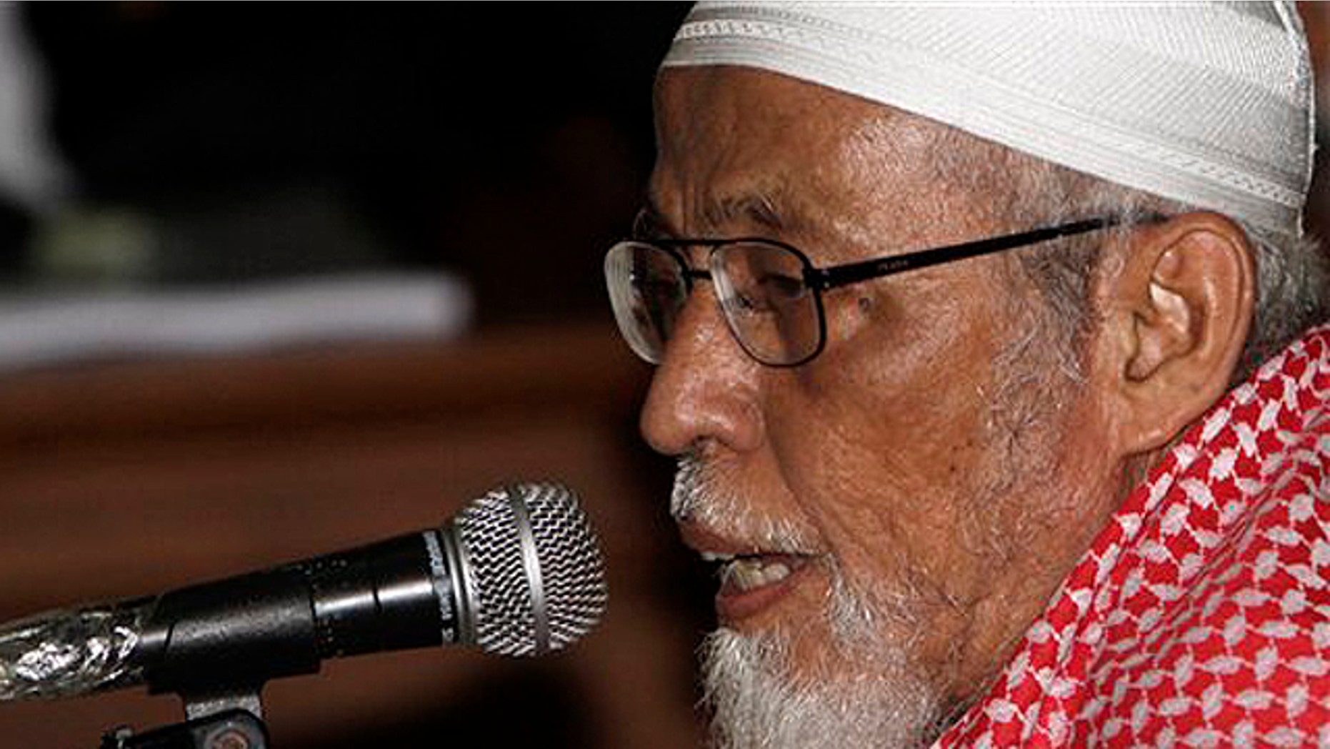 Feb. 14: Militant cleric Abu Bakar Bashi talks to judges during his trial at a district court in Jakarta, Indonesia. (AP)