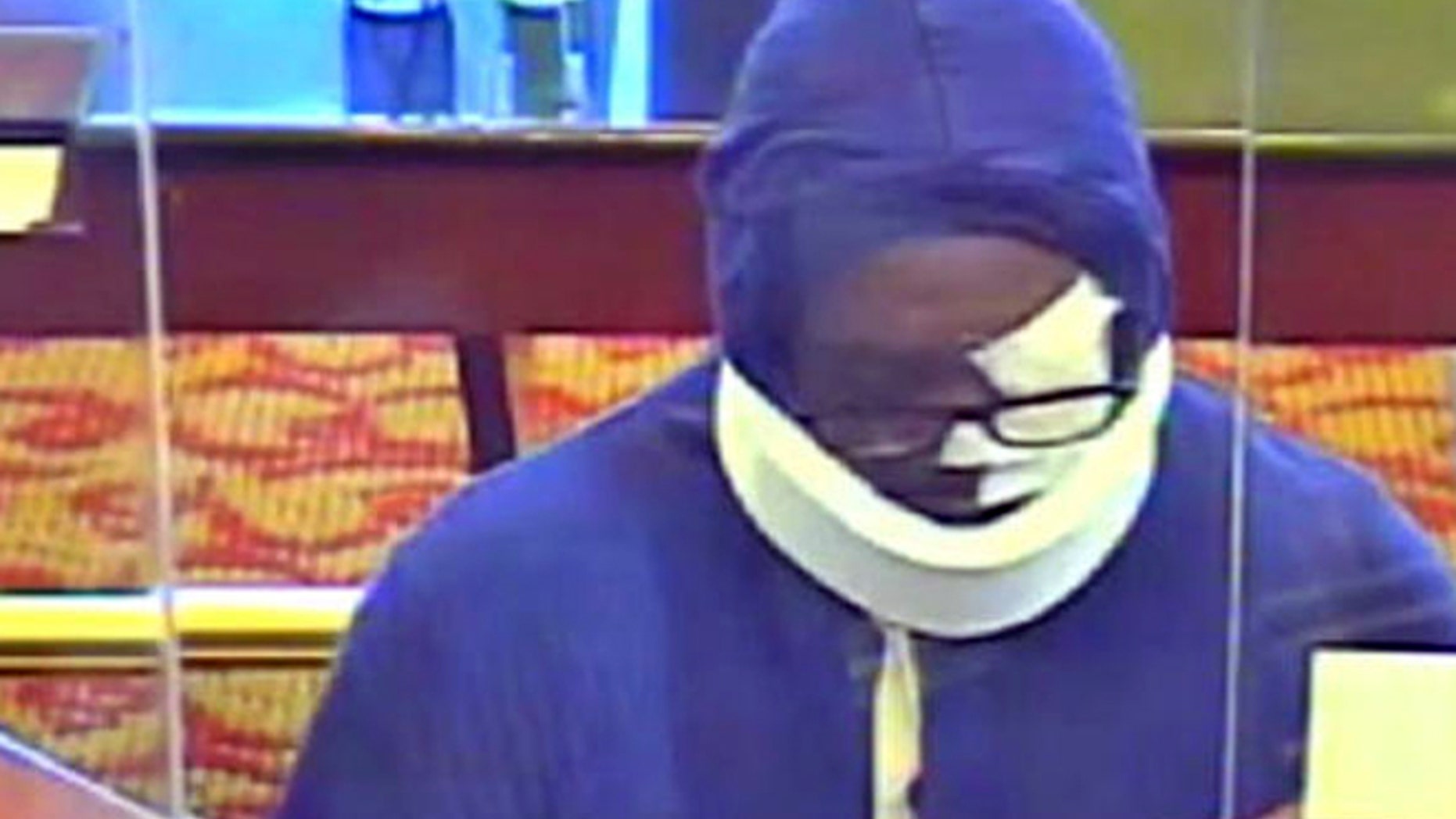 Authorities say a bank robber who disguises himself with bandages, glasses and a neck brace and has hit nine Maryland banks.