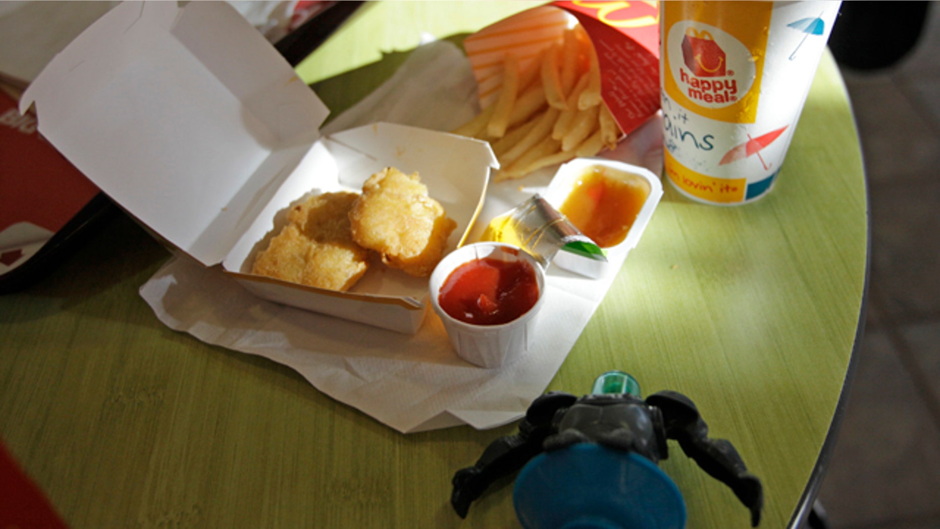 Shown is a Happy Meal at a McDonald's restaurant in San Francisco, Monday, Nov. 8, 2010. In the foreground is a character toy included with the meal from the movie Megamind. It is a happy moment for people who see the Happy Meal as anything but. San Francisco is poised to become the first major American city to require fast-food restaurants to sell meals that meet set nutritional guidelines or not include a toy with them. (AP Photo/Eric Risberg)