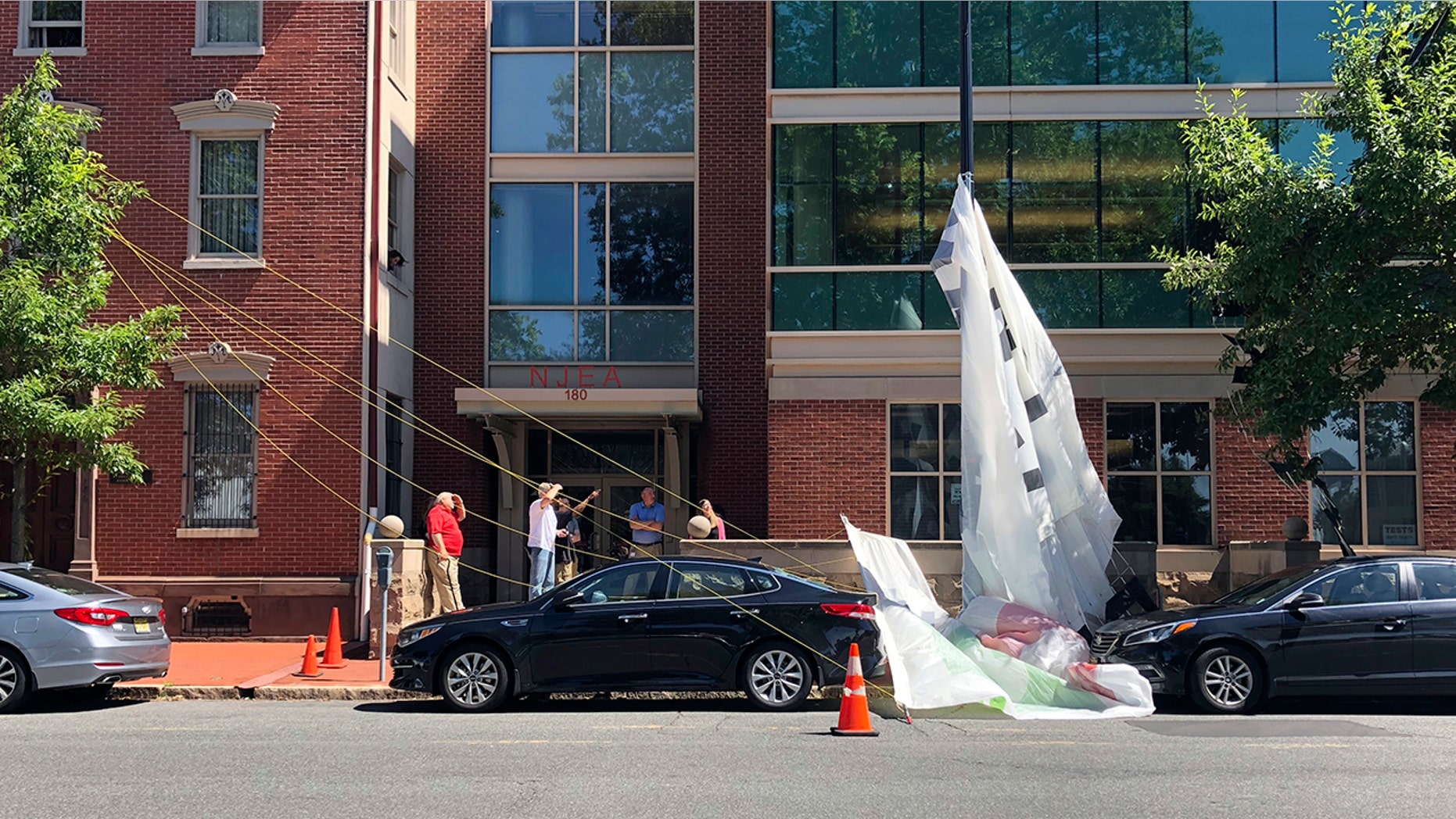 No one was injured after the banner, advocating for a the expansion of pre-kindergarten programs, broke loose on Thursday over Trenton.