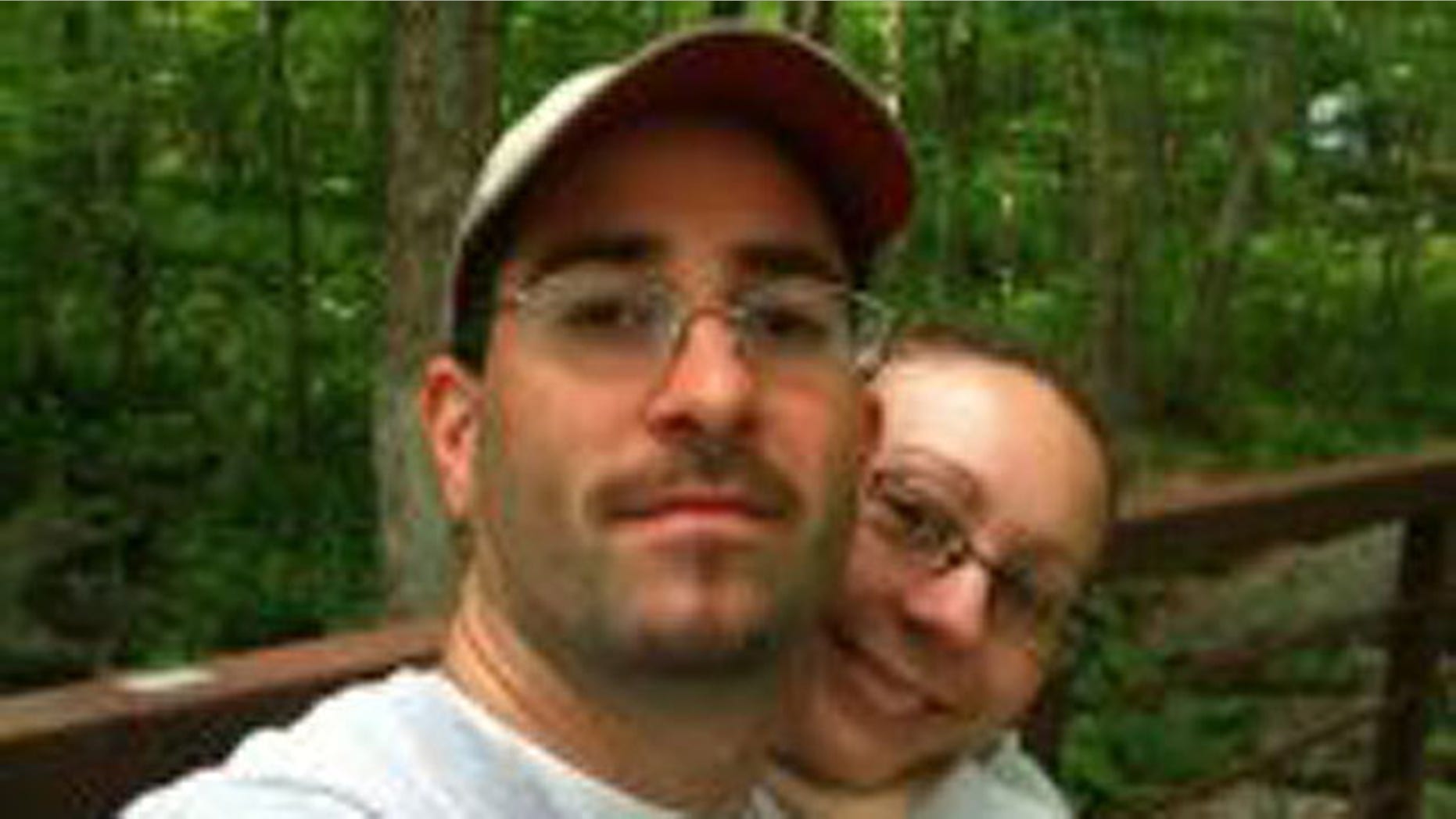 New Britain Police Officer Frank Barbagiovanni and his wife Stephanie are seen in this undated photograph.