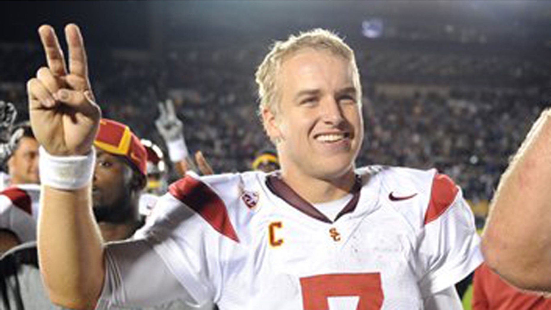 This Oct. 22, 2011 file photo shows Southern California quarterback Matt Barkley celebrating a 31-17 victory over Notre Dame, in South Bend, Ind.