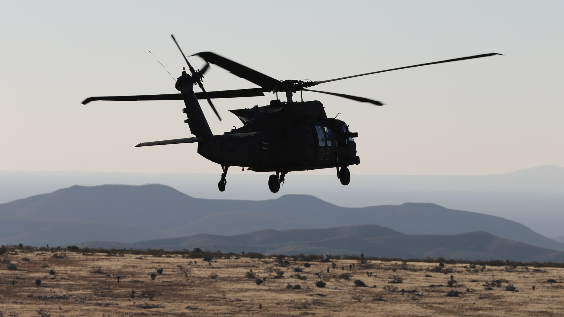 UH-60 Blackhawk helicopter crews from 3rd Battalion, 501st Aviation Regiment, Combat Aviation Brigade, 1st Armored Division completed aerial gunnery at Fort Bliss, Texas, December 12, 2017, maintaining their combat readiness and M240 machine gun skills. (U.S. Army photos by Capt. Tyson Friar, 1st Armored Division Combat Aviation Brigade Public Affairs)