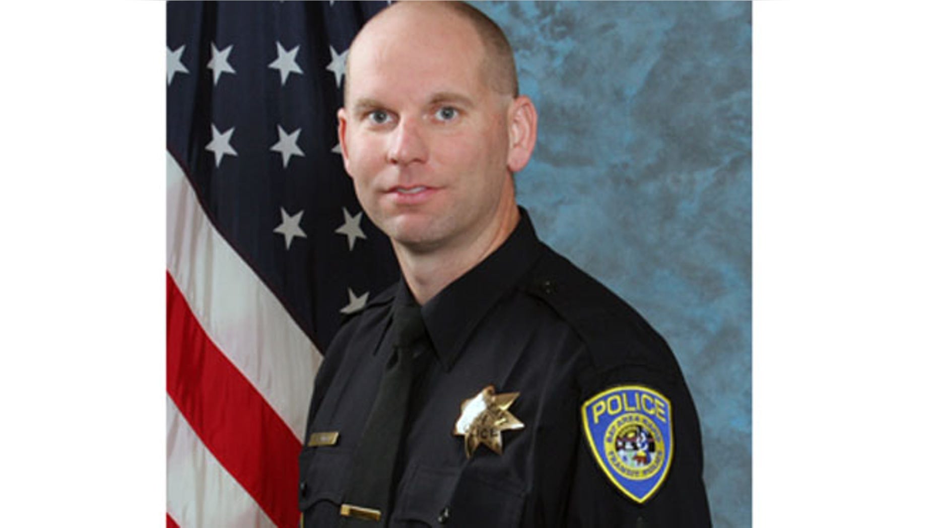 In this undated photo released by Bay Area Rapid Transit shows police Sgt. Tom Smith.