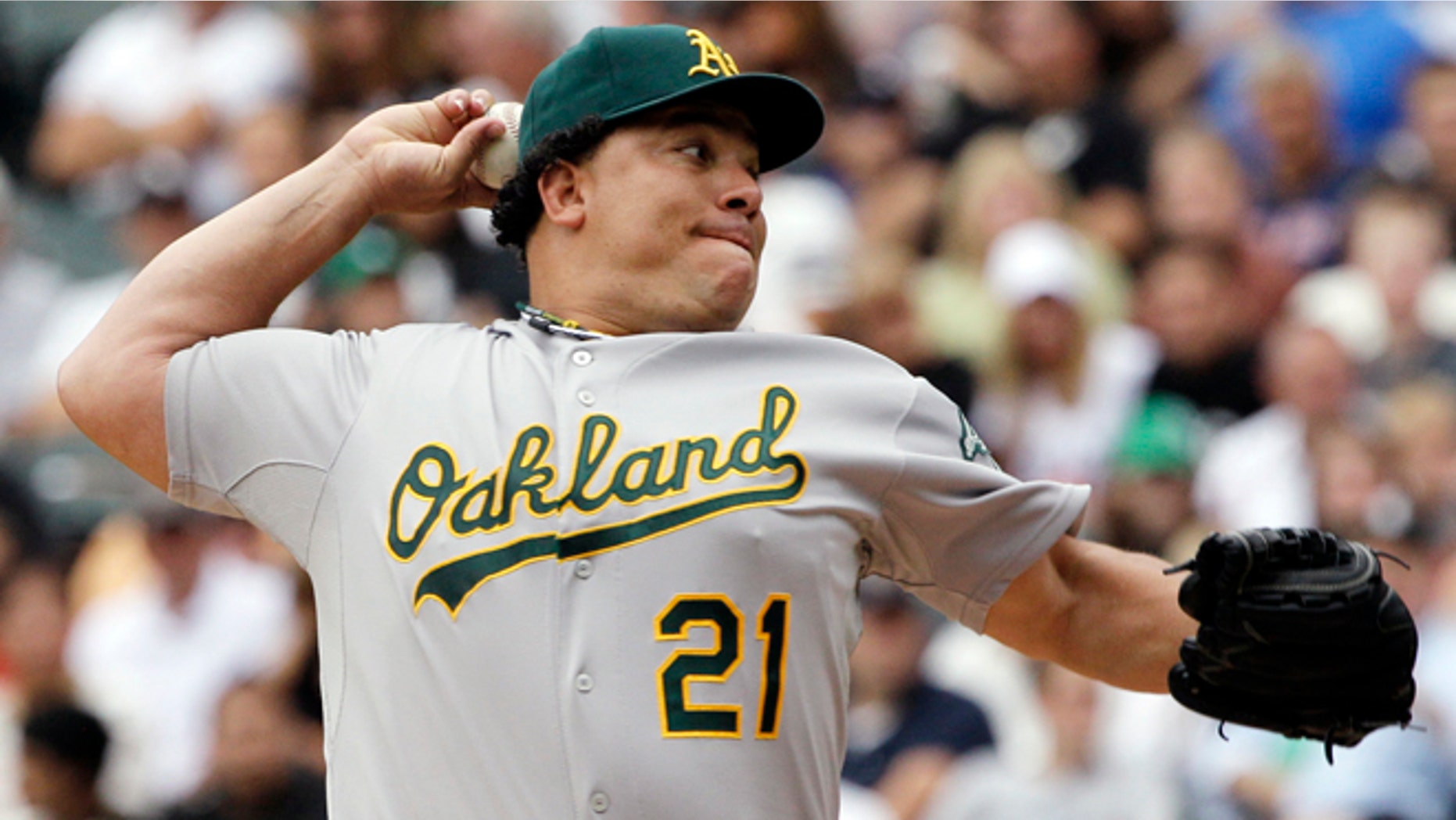 August 12, 2012: Oakland Athletics starter Bartolo Colon throws against the Chicago White Sox during the first inning of a baseball game in Chicago.