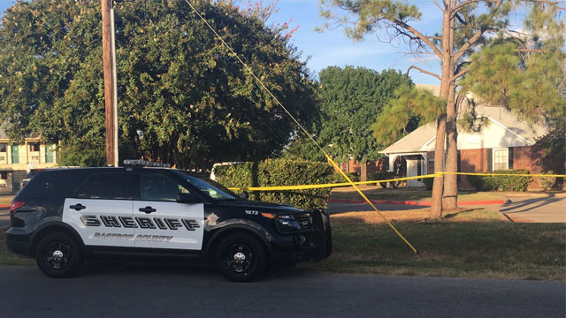 July 23, 2016: A Bastrop County sheriff's vehicle responds to a shooting at an apartment complex in Bastrop, Texas
