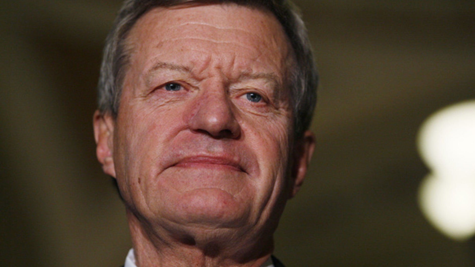 Oct. 15: Senate Finance Committee Chairman Sen. Max Baucus, D-Mont., looks on before speaking to reporters about health care reform legislation. (AP)