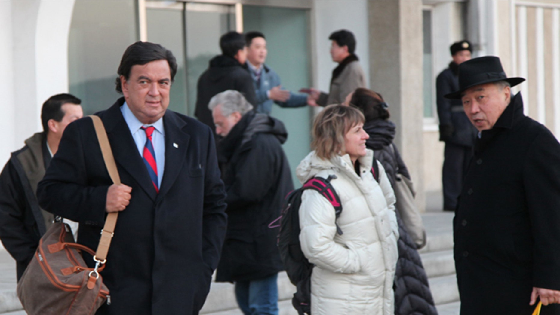 Dec. 16, 2010: In this photo released by China's Xinhua news agency, U.S. New Mexico Gov. Bill Richardson arrives in Pyongyang, North Korea.