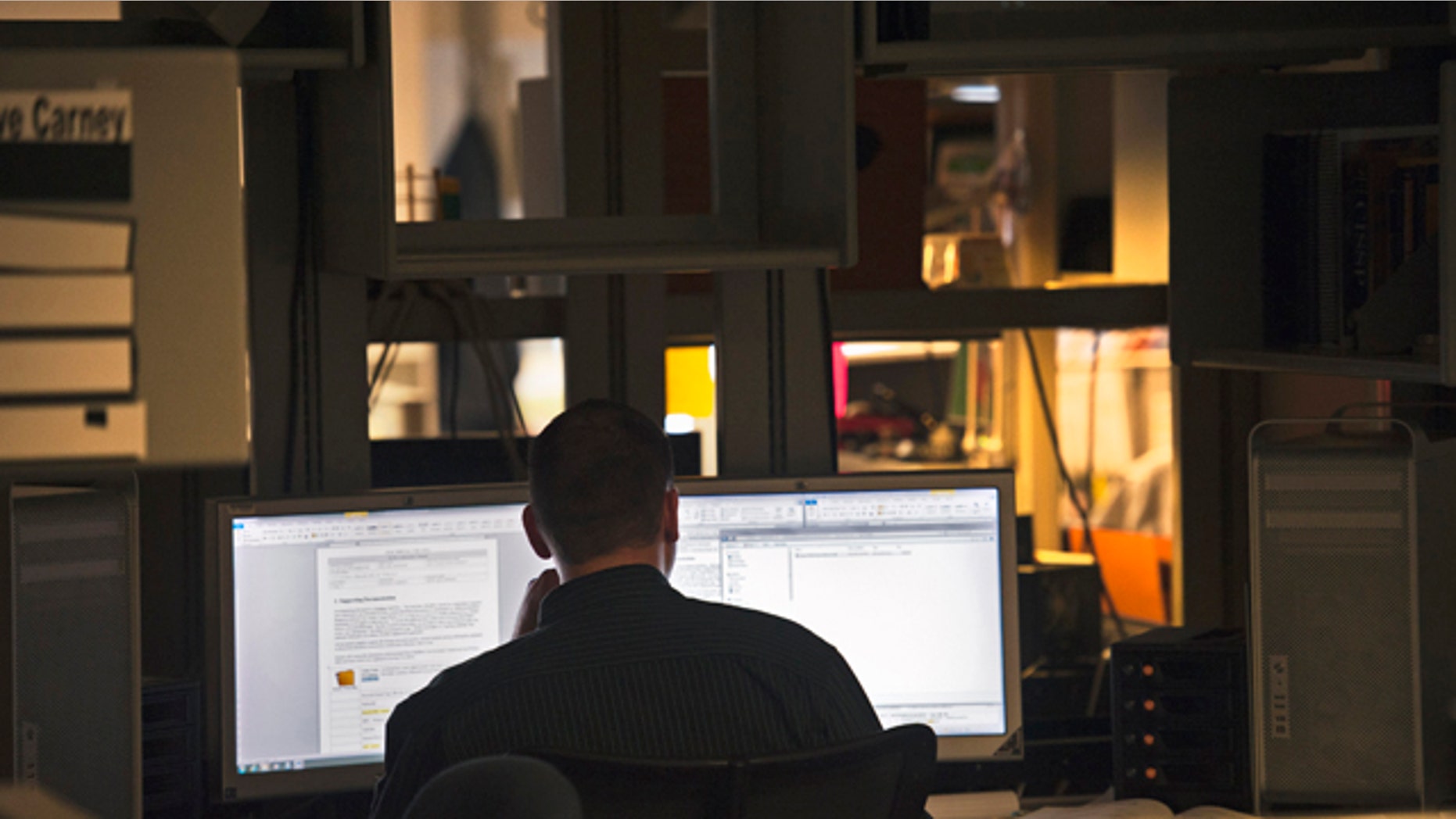 Aug. 11, 2011: A computer forensic examiner looks for evidence on hard drives at the Department of Defense Cyber Crime Center in Linthicum, Md.