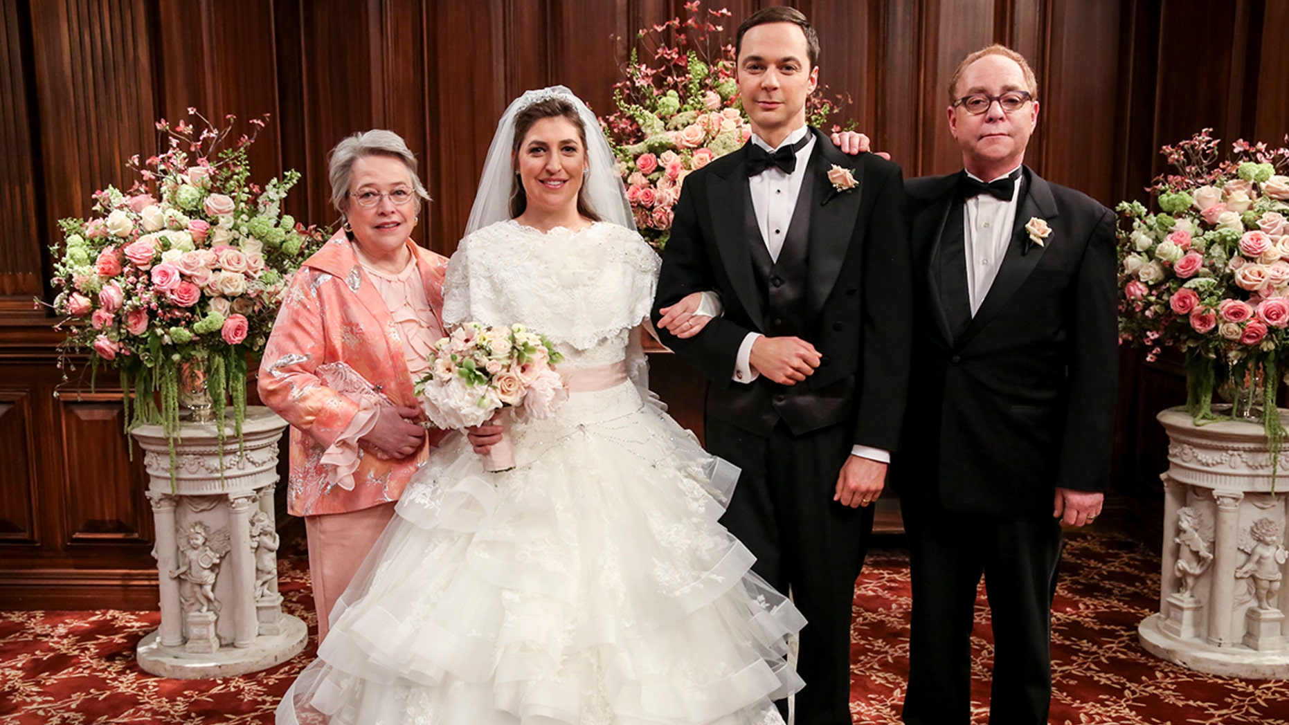 "The Bow Tie Asymmetry" - Pictured Behind the Scenes: Mrs. Fowler (Kathy Bates), Amy Farrah Fowler (Mayim Bialik), Sheldon Cooper (Jim Parsons) and Mr. Fowler (Teller). When Amy's parents and Sheldon's family arrive for the wedding, everybody is focused on making sure all goes according to plan -- everyone except the bride and groom, on the 11th season finale of THE BIG BANG THEORY, Thursday, May 10 (8:00-8:31 PM, ET/PT) on the CBS Television Network. Photo: Michael Yarish/CBS ÃÂé2018 CBS Broadcasting, Inc. All Rights Reserved.