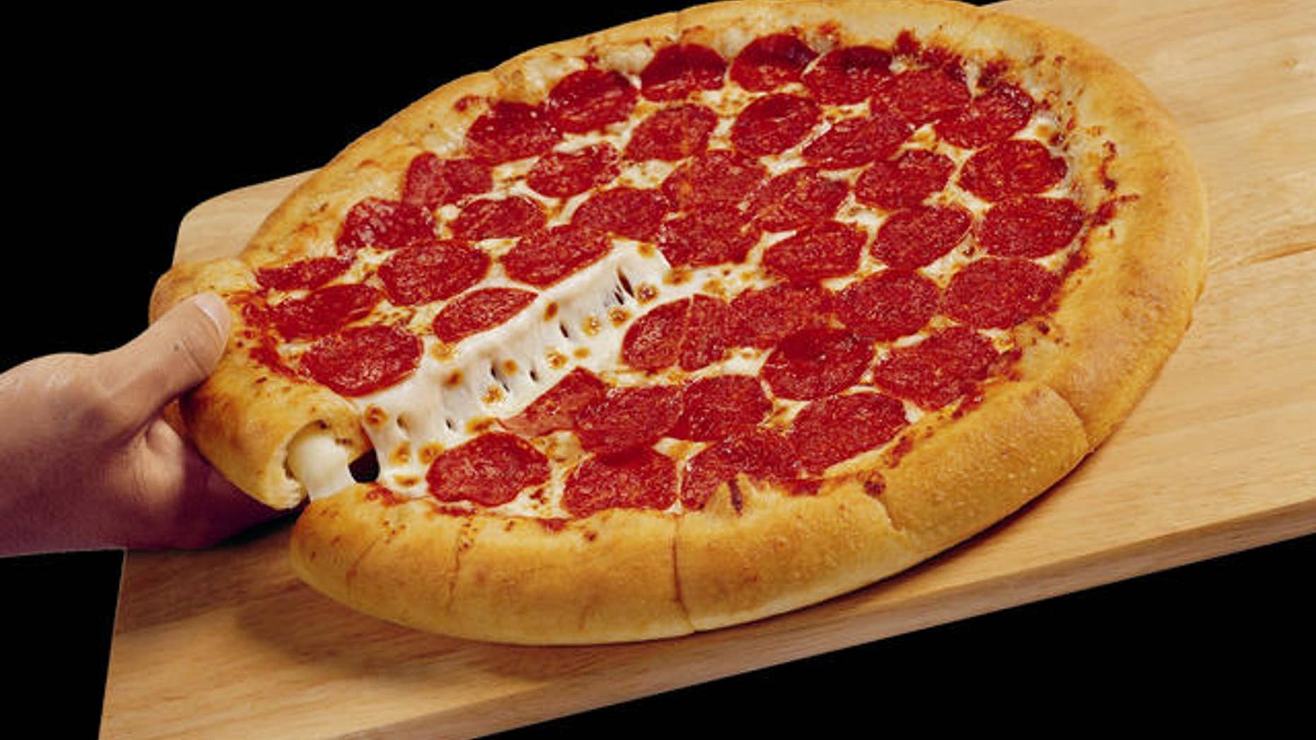 To celebrate a day stuffed with 1s and the new $10 Stuffed Crust pizza deal, Pizza Hut is giving away 1,111 Stuffed Crust Pizzas on 1/1/11. To take advantage of the offer, "Like" Pizza Hut on Facebook and keep an eye out for Pizza Hut's status update that announces the offer on Jan. 1, 2011. (PRNewsFoto/Pizza Hut) THIS CONTENT IS PROVIDED BY PRNewsfoto and is for EDITORIAL USE ONLY**