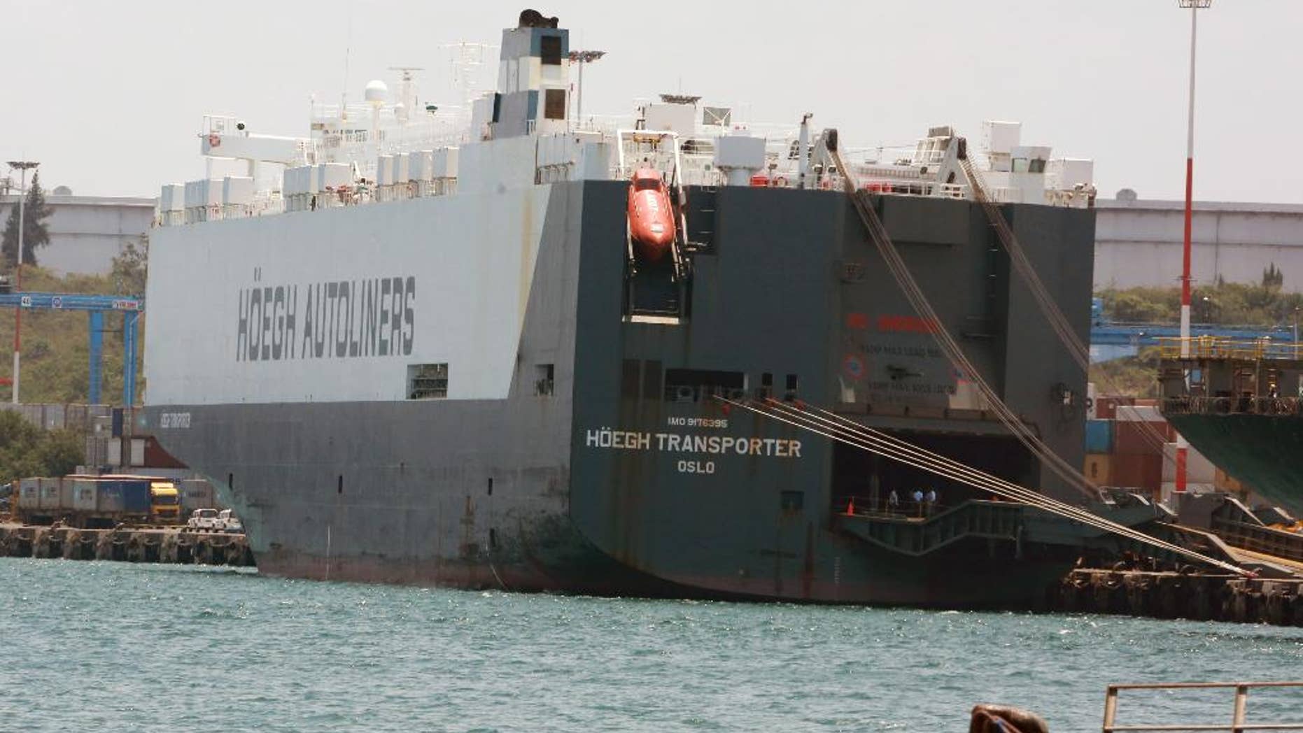 In this photo taken on Friday, Sept. 25, 2015, the Norwegian flagged Hoegh Autoliners cargo ship is photographed at the port of Mombasa, in Kenya. The Norwegian owner of a ship intercepted in Kenya says the vessel has been set free and allowed to its voyage to South Africa, West Africa and Mexico. Hoegh Autoliners said in a statement seen Sunday that, after a delay of more than a week, no crew have been arrested. No illegal drugs were found, it added. (AP Photo)