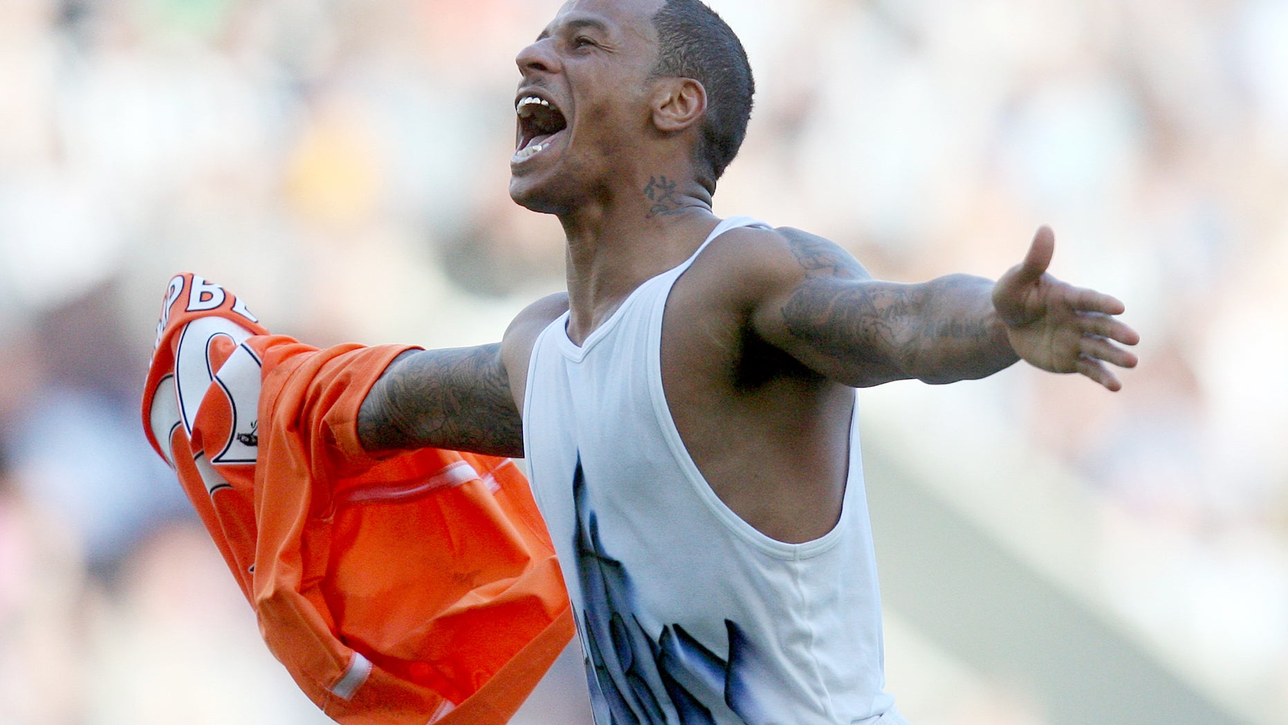 FILE- Blackpool's D.J. Campbell, celebrates his goal against Newcastle United during their English Premier League soccer match at St James' Park, Newcastle, England, in this file photo dated Saturday, Sept. 11, 2010. Campbell now plays for Blackburn Monday Dec. 9, 2013, in the second-tier League Championship, one step below the Premier League. It is announced Monday Dec. 9, 2013, that Campbell who now plays for Blackburn is one of six people arrested by police in English football's latest match-fixing investigation, following an investigation by a national newspaper. (AP Photo/Scott Heppell, FILE)