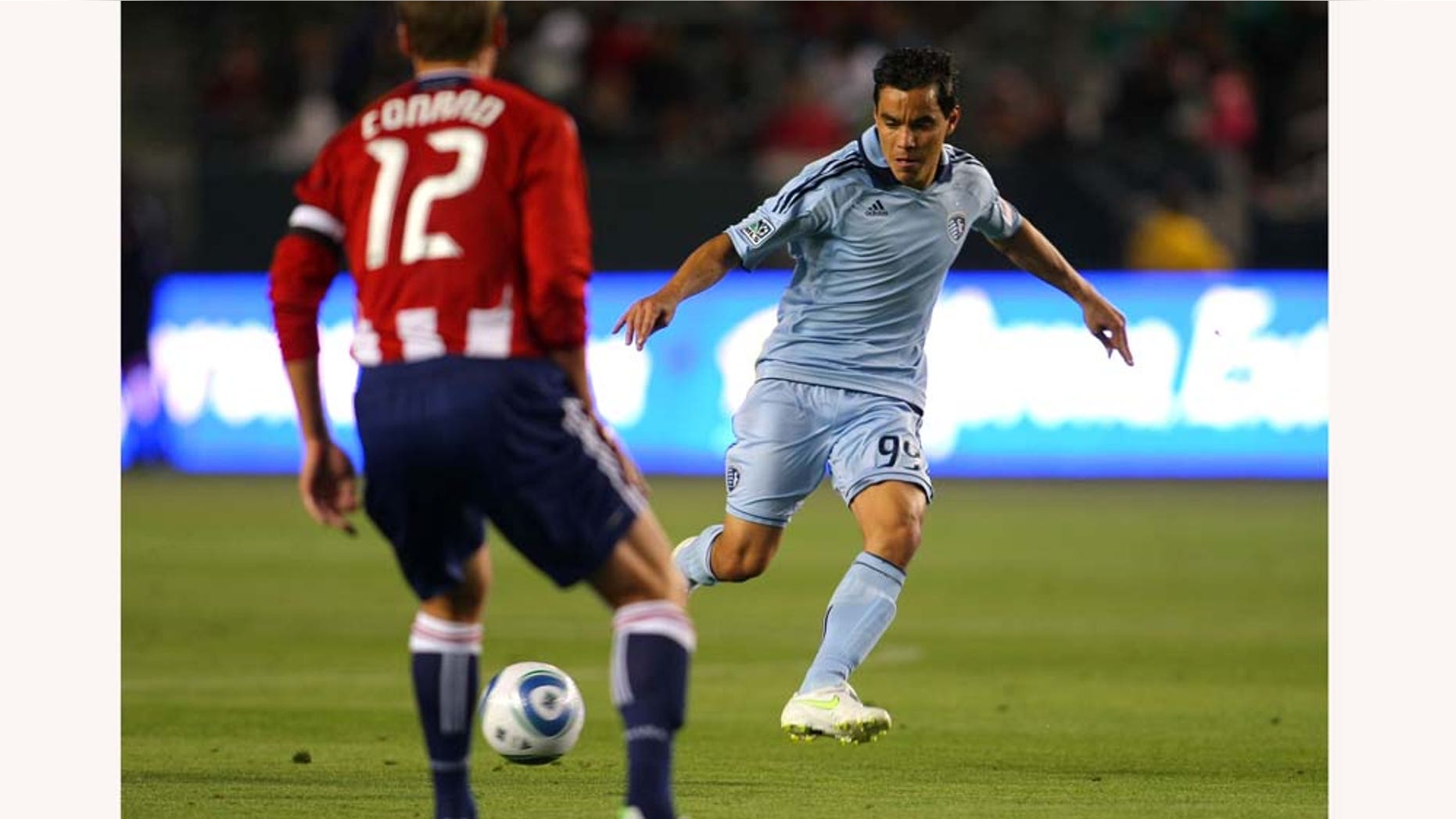 CARSON, CA - MARCH 19: Omar Bravo #99 of Sporting Kansas City passes the ball in the first half during the MLS match against Chivas USA at The Home Depot Center on March 19, 2011 in Carson, California. SKC defeated Chivas USA 3-2. (Photo by Victor Decolongon/Getty Images)