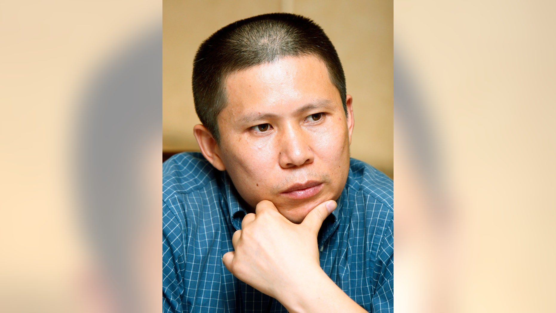 FILE - In this July 17, 2009 file photo, legal scholar Xu Zhiyong, is seen at a meeting in Beijing, China. Xu, one of China's most well-known civil rights advocates, has been formally arrested on charges of disrupting public order, as Beijing cracks down on grassroots efforts to build a civil society that may challenge its rule. Xu, a founder of the loosely organized New Citizens group, has called for people to hold monthly dinners to discuss China's constitution and other issues. Several citizen activists who want to hold public officials to account and champion the underprivileged stand trial this week in Beijing in cases reflecting an intense campaign under leader Xi Jinping to quash any potential threat to China’s one-party rule. (AP Photo/Greg Baker, File)