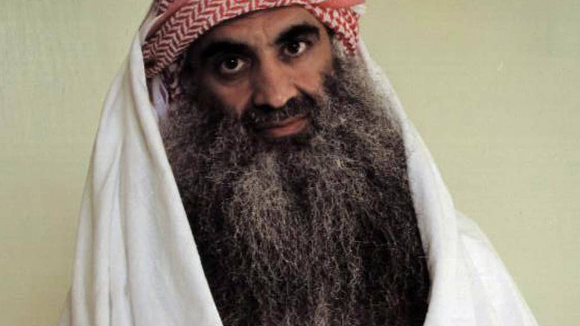 FILE - This undated photo downloaded from the Arabic language Internet site www.muslm.net and purporting to show a man identified by the Internet site as Khalid Sheik Mohammed, the accused mastermind of the Sep. 11 attacks, is seen in detention at Guantanamo Bay, Cuba. One of the two psychologists who played a key role in designing the CIA’s program of brutal interrogations is defending the treatment of al-Qaida detainees and disputing the Senate report that criticized it. (AP Photo/www.muslm.net)