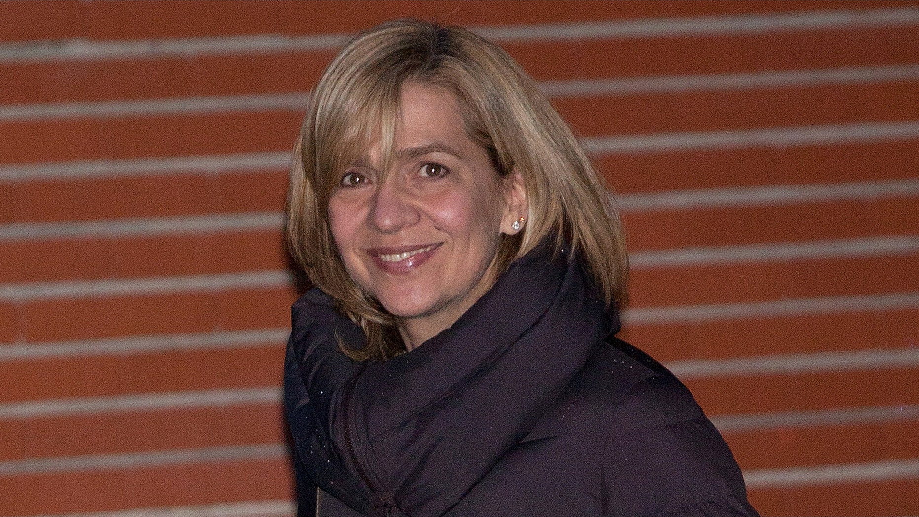 Princess Cristina of Spain leaves after visiting King Juan Carlos I of Spain at La Milagrosa Hospital on March 4, 2013 in Madrid, Spain.