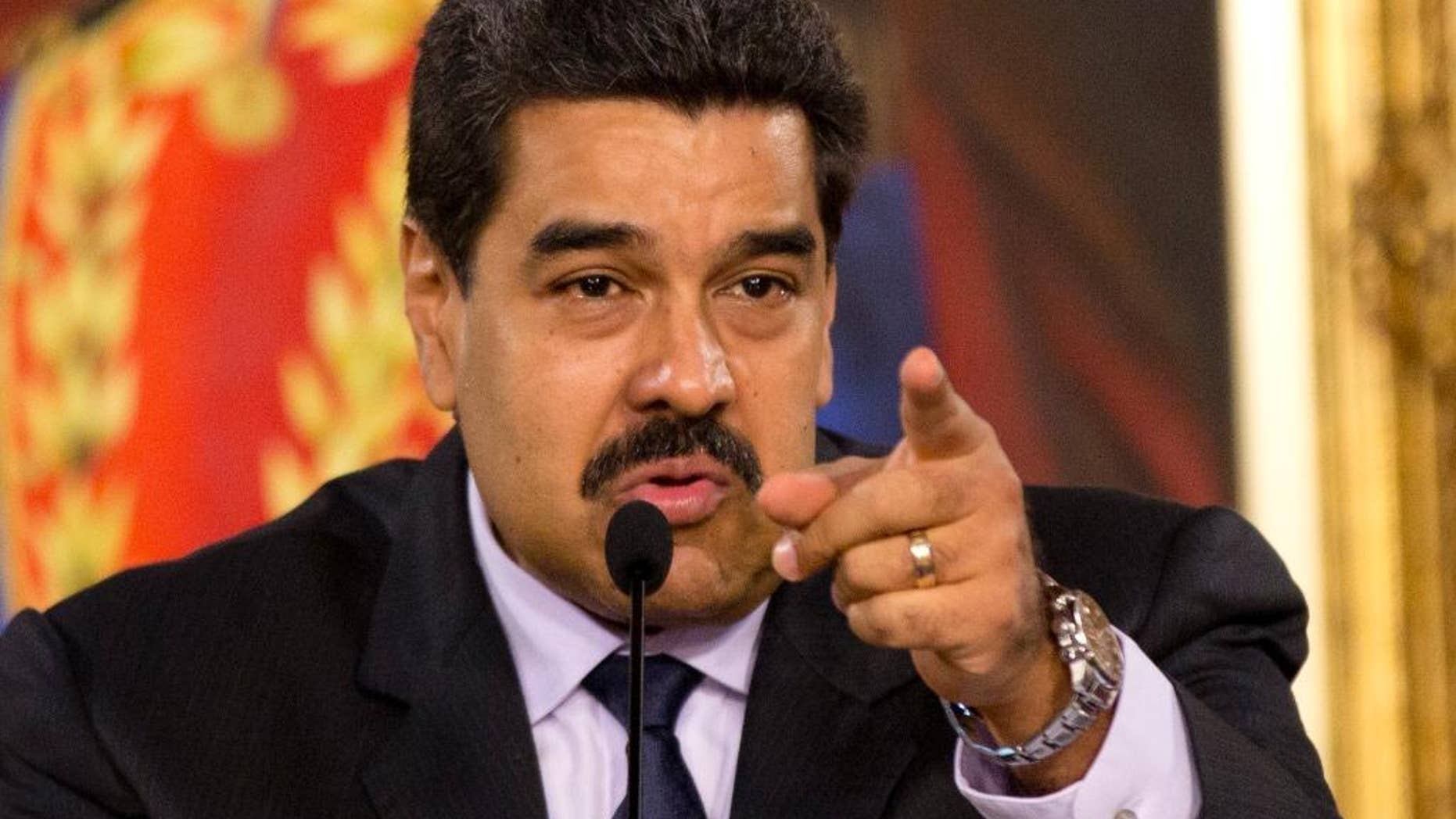 FILE - In this April 12, 2016 file photo, Venezuela's President Nicolas Maduro speaks during the installation of a truth commission, at Miraflores presidential palace in Caracas, Venezuela. Opponents of President Nicolas Maduro promise to flood the streets of Caracas on Thursday, Sept. 1, in a major test of their strength and the government’s ability to tolerate growing dissent. (AP Photo/Ariana Cubillos, File)