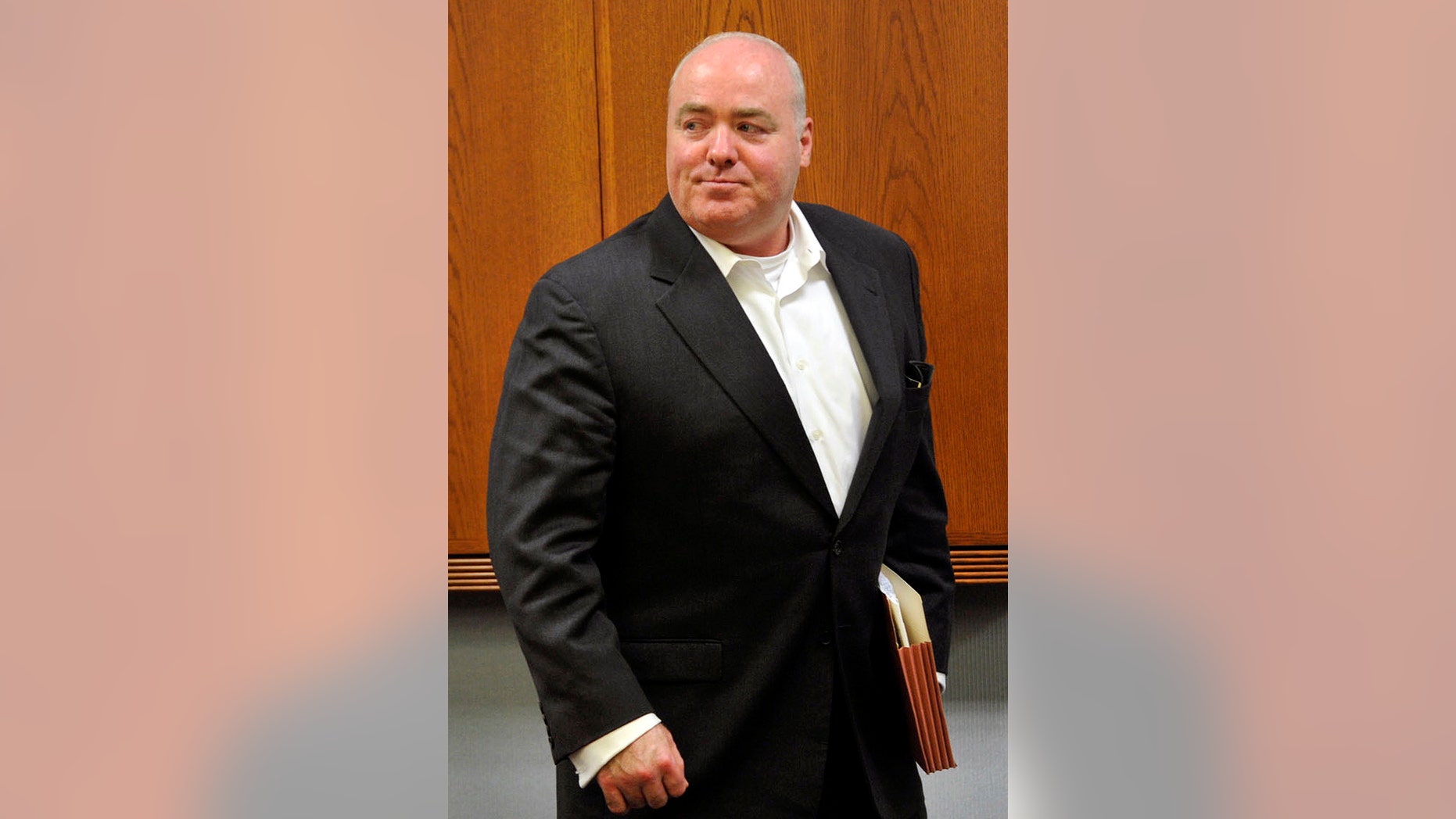 FILE - In this April 30, 2013 file photo, Michael Skakel leaves the courtroom after the conclusion of trial regarding his legal representation at State Superior Court in Vernon, Conn. A Connecticut judge on Wednesday, Oct. 23, 2013, granted a new trial for Skakel, ruling his attorney failed to adequately represent him when he was convicted in 2002 of killing his neighbor in 1975. (AP Photo/The Greenwich Time, Jason Rearick, Pool, File)