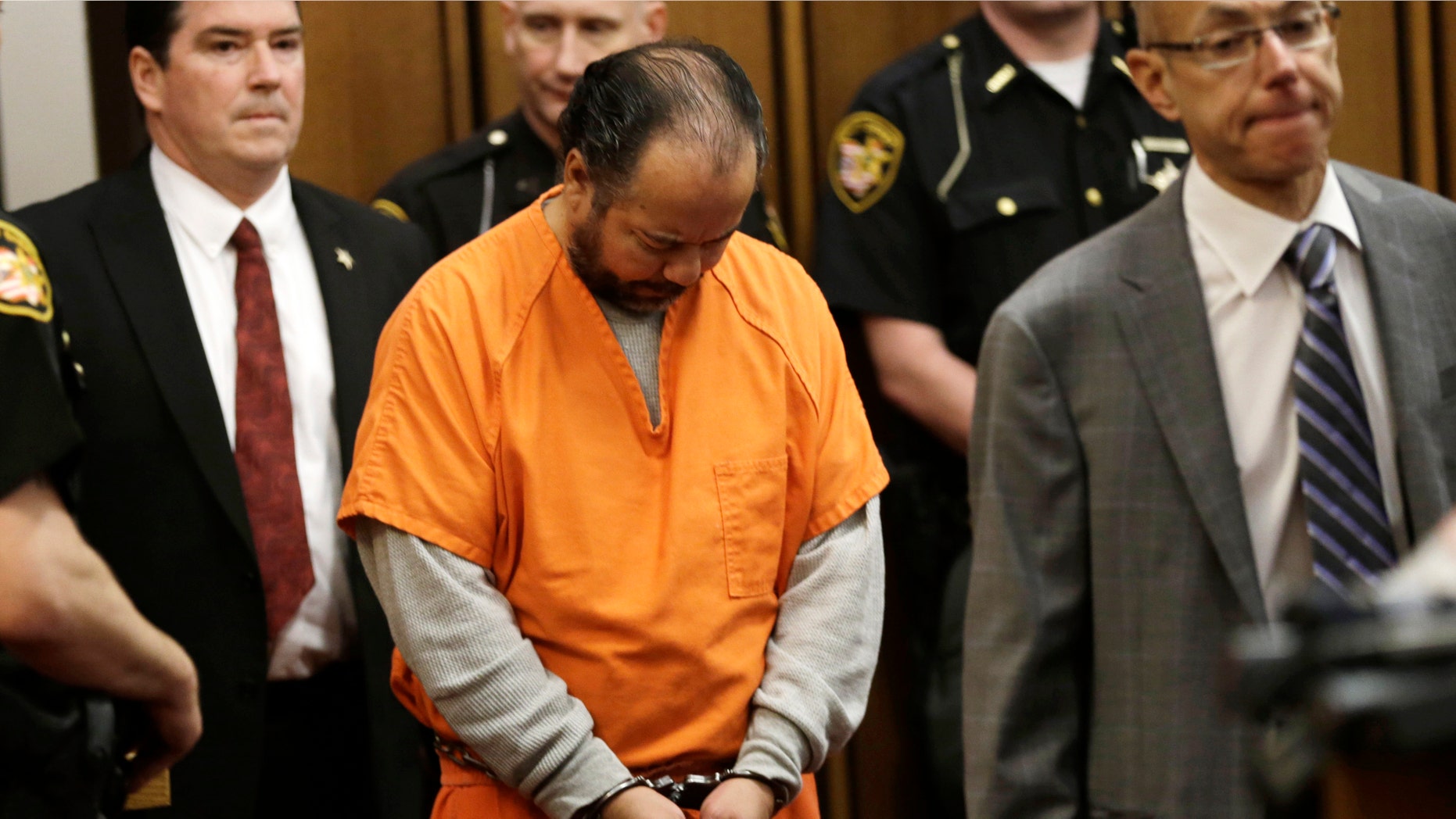 Ariel Castro enters the courtroom for his arraignment Wednesday, June 12, 2013, in Cleveland.